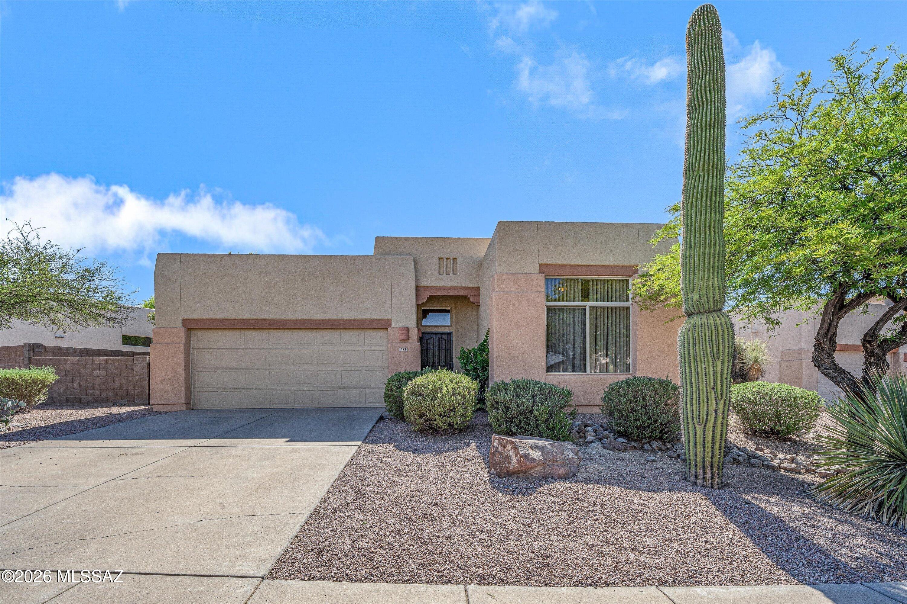 Welcome home to this beautifully updated 3-bedroom, 2-bathroom gem tucked into a sought-after gated community ''Desert Montage'' on Tucson's west side. From the moment you walk in, the open-concept layout and abundant natural light create a bright, airy feel throughout. The showstopper: a fully renovated kitchen that's as functional as it is gorgeous, perfect for everything from quiet weeknight dinners to hosting friends. It flows seamlessly into the living and dining areas, making this home ideal for both everyday living and entertaining. Step outside and take in unbeatable desert views. The home backs directly to a striking rock formation dotted with saguaros, giving you a front-row seat to Tucson's iconic desert scenery right from your backyard. Whether it's morning coffee or sunset wind-downs, the views here don't disappoint. Located in a secure, gated neighborhood on the west side, you're close to hiking trails, local favorites, and easy access to the rest of town. This one checks every box: move-in ready, beautifully updated, and set against one of the most gorgeous natural backdrops Tucson has to offer. Don't miss this one. Schedule your showing today!