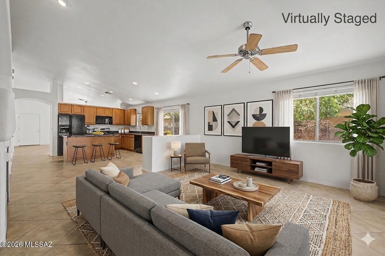 Seller will accept or counter offers between $430,000 and $450,000. 3D Matterport & Floor Plan available Call Listing Agent For Details Nestled on a desirable cul-de-sac, this tastefully renovated home offers fantastic mountain views! Discover a freshly painted interior featuring tile flooring, plantation shutters, ceiling fans, and tall vaulted ceilings that add to the spacious feel. Airy living/dining room invites to unwind, while the sizable family room, enhanced by a cozy fireplace, sets the perfect spot for entertaining.  Renewed kitchen displays recessed lighting, abundant cabinets, built-in appliances, a pantry, granite counters, a center island with a breakfast bar, and a breakfast nook. Impeccable main bedroom is complete with a private bathroom and a walk-in closet.
