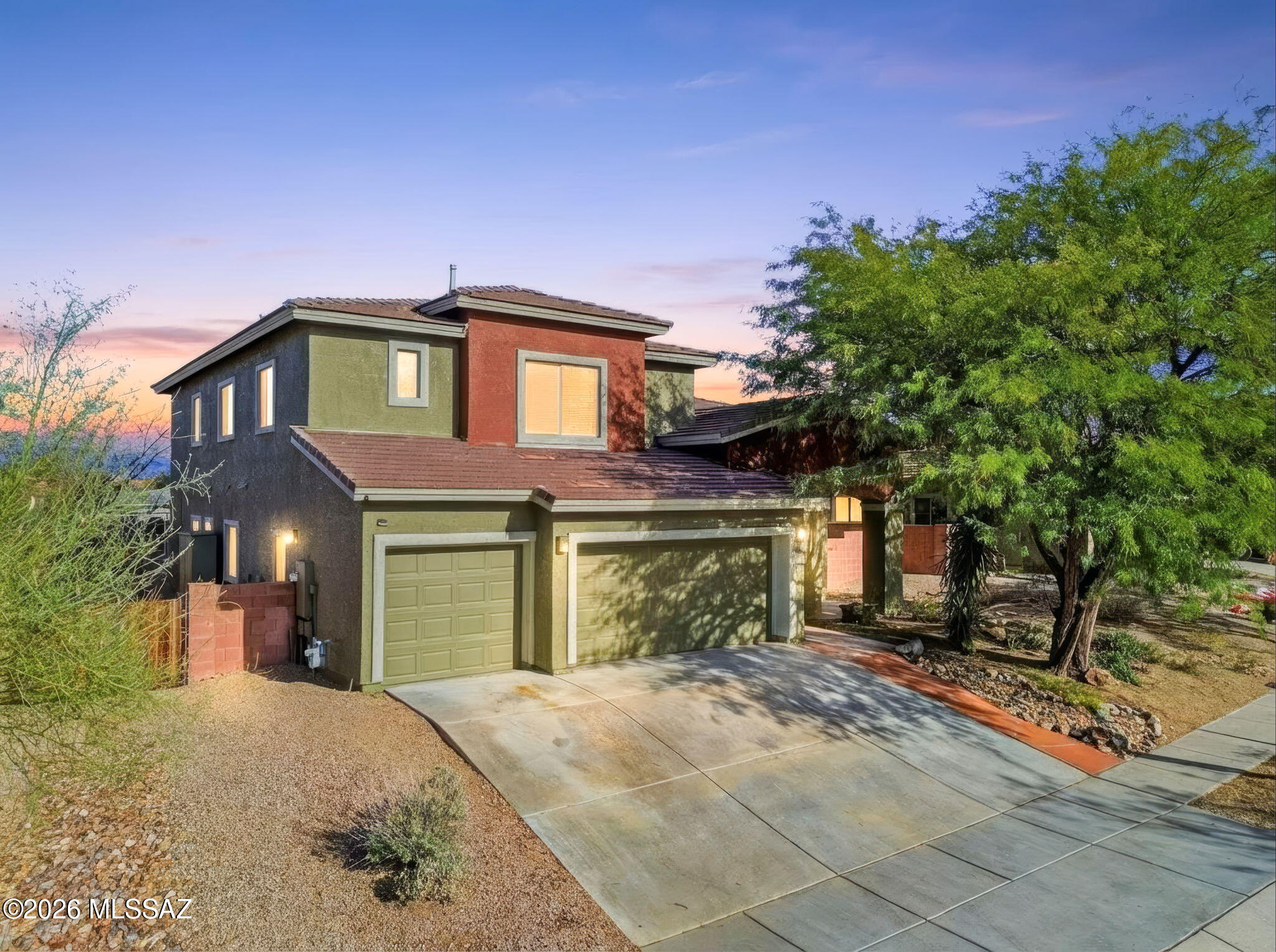 Welcome home to nearly a 1/4 acre lot in award winning Vail Schools with a two story, three car garage, 2900+ sq ft retreat with real grass in the backyard, water feature, hot tub, and workshop/shed. Surrounded by walkable green belts in a community with amenities including pool, hot tub, basketball court, shade structures and play areas. Upgraded flooring (no carpet) throughout the home with the primary with garden tub downstairs, a large bonus loft upstairs (could be converted into a 5th bedroom or two smaller bedrooms for 6 total bedrooms.) Kitchen has a custom copper sink, extensive counter space, gas range, and maple cabinets. The backyard oasis with mountain views has a workshop/shed/playhouse, with a fountain, real grass and a hot tub. Welcome home! One bedroom has a walk in closet with tons of extra shelves. Another has a built in wall and gun safe. The spacious primary bedroom is downstairs and has a large picture window giving you a view of the amazing backyard. Gorgeous slate tiles top the double vanity; separate soaking tub, shower area, private toilet stall and floors giving it a warm rich look. 

 

The soaring 15 foot ceilings in the formal living and dining room areas make this space look and feel colossal. The rustic-themed kitchen has newer appliances, warm rich colored tile and custom finished maple cabinets with pull out shelves. A custom copper sink and faucets adds to the rustic ambiance of this eat-in kitchen which has extra seating at the island and double sliding doors to the large back patio. There is a misting system and a large 6 person hot tub on the patio. The downstairs family room allows TV viewing from the kitchen and also looks onto THE AMAZING back yard.

 

Many upgrades have been added to this home. The dark wood floors give the rooms a regal feel. Tinted windows, 2" wooden blinds and ceiling fans help with climate control. A newer water heater is in the garage. The exterior is freshly repainted. Much of the roof was replaced recently - move in and enjoy!

 

If you ever want to leave the house, the community has an Olympic sized gated pool, hot tub, play pool, rest rooms, a park with walking /biking trails, a playground and basketball court.  Many community events allow you to get to know your neighbors and the area itself. Peaceful, clean, quiet desert surrounds you and shopping, restaurants and stores of all kinds are just a few miles away.  Welcome home!
