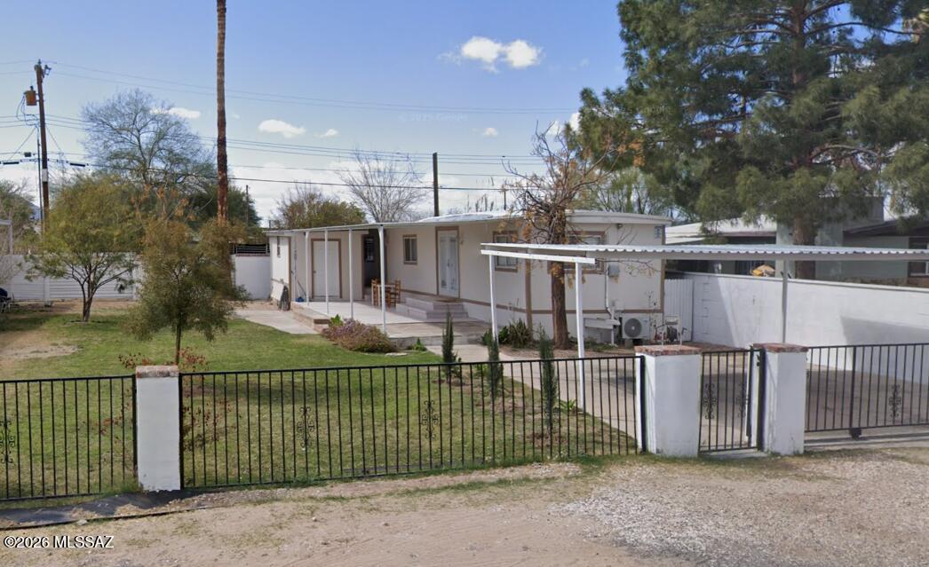 Charming 2-bedroom, 1-bathroom mobile home located in a quiet and friendly Tucson neighborhood. This property features a fully fenced yard with mature trees, offering a private and well-maintained outdoor space. The home includes central air conditioning and heating, updated kitchen and bathroom finishes, hardwood floors, and washer/dryer access.