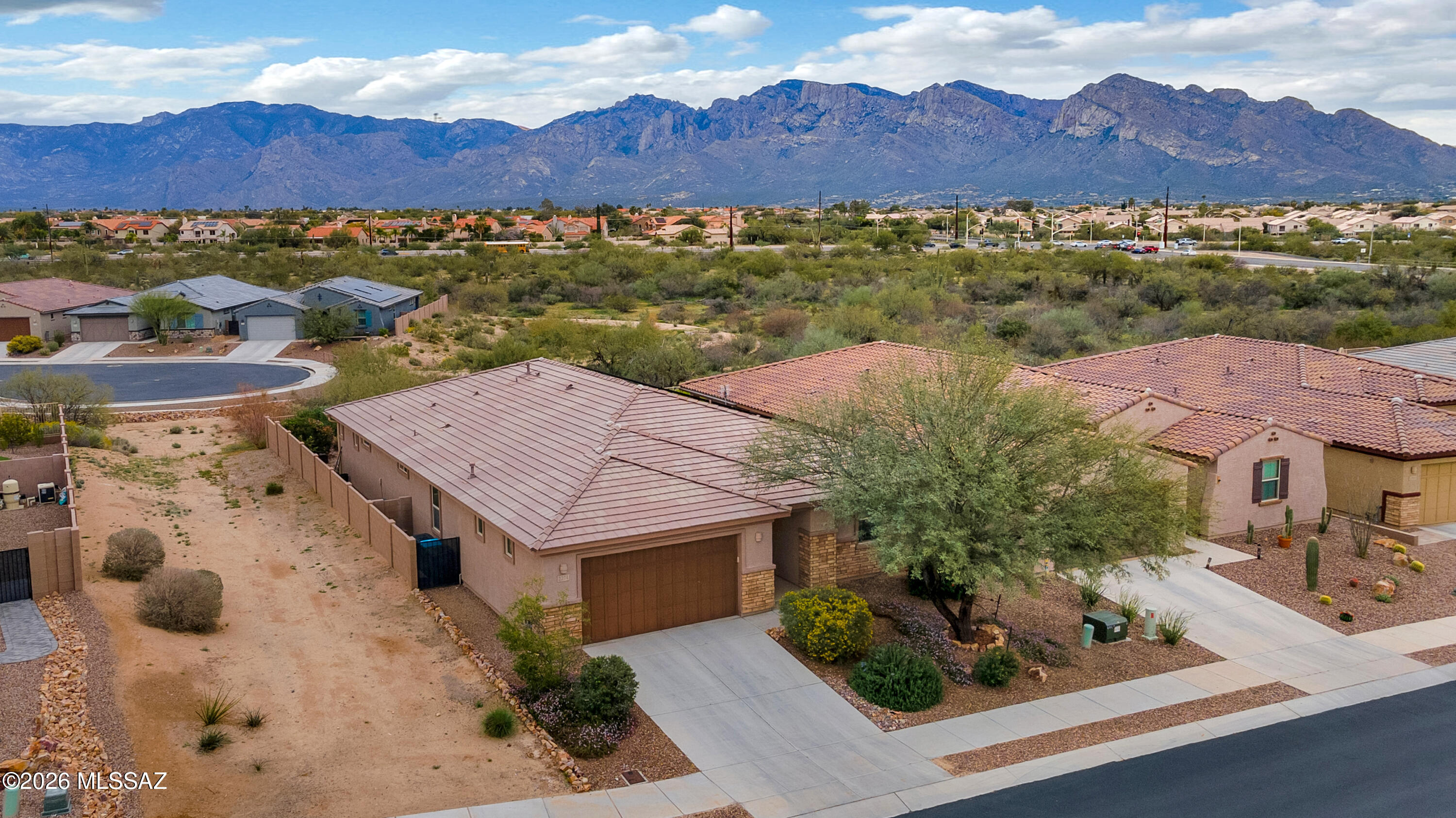 Beautiful Home in Saguaro Viejo - Gated Community with Mountain Views

Welcome to this meticulously maintained 5-bedroom, 3-bath energy-efficient home in the desirable gated community of Saguaro Viejo.

The roof and fully paid solar system are both just 5 years old, offering peace of mind and long-term savings. HOA dues are only $82 per month.

This spacious home features a soft water system and water filtration, generous living areas, and a desirable three-car tandem garage -- perfect for extra storage, a home gym, workshop space, or that weekend toy.

Step outside and enjoy stunning Catalina and Tortolita Mountain views while relaxing in your hot tub -- with ample space to build a pool if desired. Located near multiple parks, hiking and biking trails, and even a nearby 1-acre dog park, this home offers the perfect blend of comfort, efficiency, and outdoor lifestyle.
