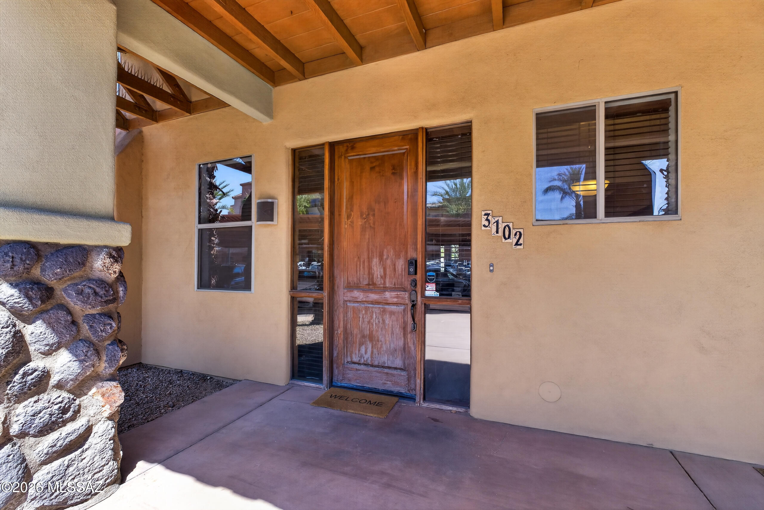 Modern contemporary condo in Sam Hughes Place at the SE corner of Campbell and 6th St. Easy walk to Arizona Stadium, McKale Center, Hillenbrand Aquatic Center, Banner Hospital & all that the UA campus has to offer. Close to downtown, restaurants & entertainment. 2 bed 2 bath with spacious & bright great room floor plan. A ground floor unit (no interior steps). Experience a modern kitchen with plenty of kitchen cabinetry, ceramic counter tops breakfast bar and dining area. Flooring is beautiful easy to maintain stained concrete. Primary bedroom is it's own retreat space with private patio. In unit stackable W/D
HOA covers water, sewer, gas, security, roof, and exterior & common area maintenance. Two reserved covered parking spaces, #210 & #218, located just to the south of the unit