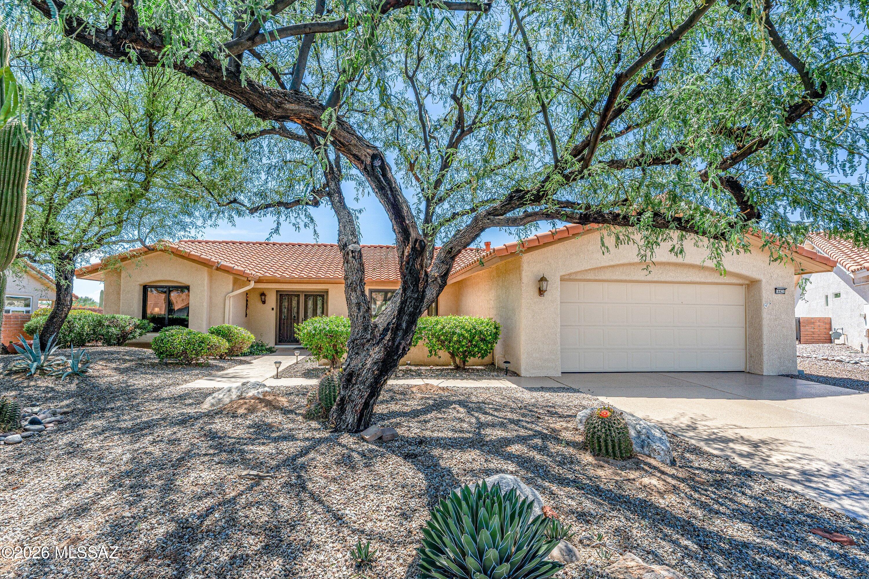 Discover an impeccably maintained oasis of mountain views and comfort in the highly acclaimed Sun City Oro Valley a 55+ active adult community. Featuring the popular and expansive Crown Point floor plan, this 2BD/2BA+Office/Den+ Bonus Room (1,941sqft) contemporary residence perfectly balances comfort with everyday functionality. Tucked away in a quiet, peaceful cul-de-sac lot, the home stands out by offering spectacular, dual-aspect mountain vistas, allowing you to enjoy scenic desert ridges from both your front entryway and your private back patio. The interior opens into a light-filled split floor plan dressed in a warm, welcoming neutral color palette. Thoughtfully divided for comfortable daily life and effortless hosting, the layout features independent formal living and dining spaces that flow logically into casual family areas. At the center of daily routines is an upgraded chef's kitchen that comes complete with a bright breakfast nook and solid Quartzite countertops. Working from home or enjoying a creative hobby is a breeze thanks to a dedicated, independent flex den, while an exceptional separate bonus room positioned directly off the garage offers the perfect footprint for a specialized studio, workshop, or secure overflow storage zone. The expansive primary suite functions as your personal retreat, providing a grand layout, extensive closet storage, and maximum separation from the guest bedroom wing. The indoor living spaces transition seamlessly out to a beautiful, low-maintenance rear patio layout. Equipped with roller screens for late afternoon comfort, the outdoor area is built for easy desert lifestyle habits, offering the ultimate setting to host weekend barbecues or unwind under Oro Valley's big skies. Living on Glen Hollow Place places world-class active-adult recreation right outside your front door. Residents enjoy premium proximity to community golf, fitness hubs, tennis, pickleball courts, and a network of scenic paved walking paths. Paired with swift access to local dining, and premier retail nodes along Rancho Vistoso Boulevard, this move-in-ready property is an absolute must-see!