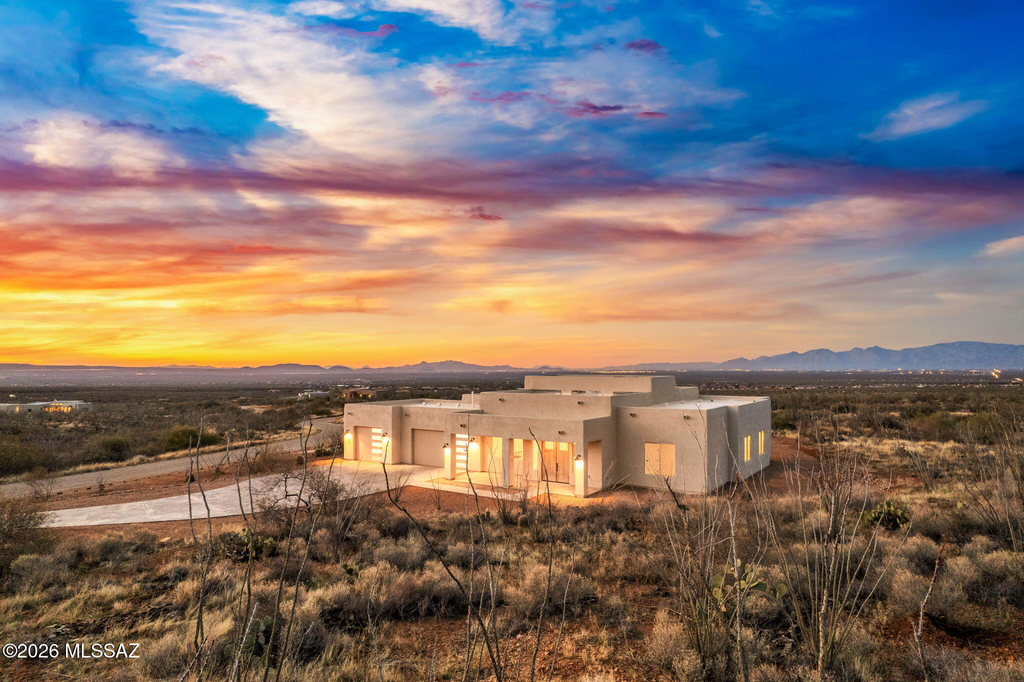 Stunning New Build perched on a 4.1 pristine acres lot nestled in the foothills of the Santa Rita Mountains with Magnificent Unobstructed Mountain Views & City Lights as far as the eye can see! This home located in Ocotillo Preserve offers an oversized 3 car garage, 5 bedrooms/3 baths, 12' cathedral ceilings in the Great Room w/10' ceilings in bedrooms & Porcelain Tile floors thru out. The Gourmet kitchen features 36'' gas cooktop, double oven/micro/convection cooking, Quartz CT, generous cabinet storage & large island w/breakfast bar to congregate and make those special memories. After a long day, retreat to your spacious master bd & enjoy the fabulous views from the bay window, draw a bubble bath or just curl up with your favorite novel. Welcome Home!!!