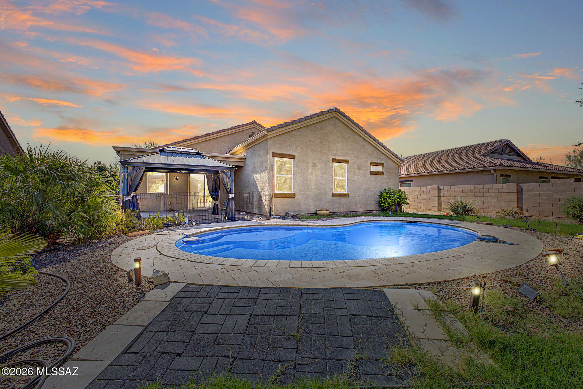 If a backyard oasis is what you're looking for, you've found it in Saguaro Bloom! Welcome to your new home, a beautifully maintained 3-bedroom, 2-bath home with a den offering 1,844 square feet of comfortable living space. Step outside to your private backyard oasis with a sparkling pool, poolside gazebo, and mature fruit trees--perfect for relaxing or entertaining. Complete with a three-car garage and access to Saguaro Bloom's parks, trails, and community amenities, this home is ready for you to enjoy Arizona living at its best.