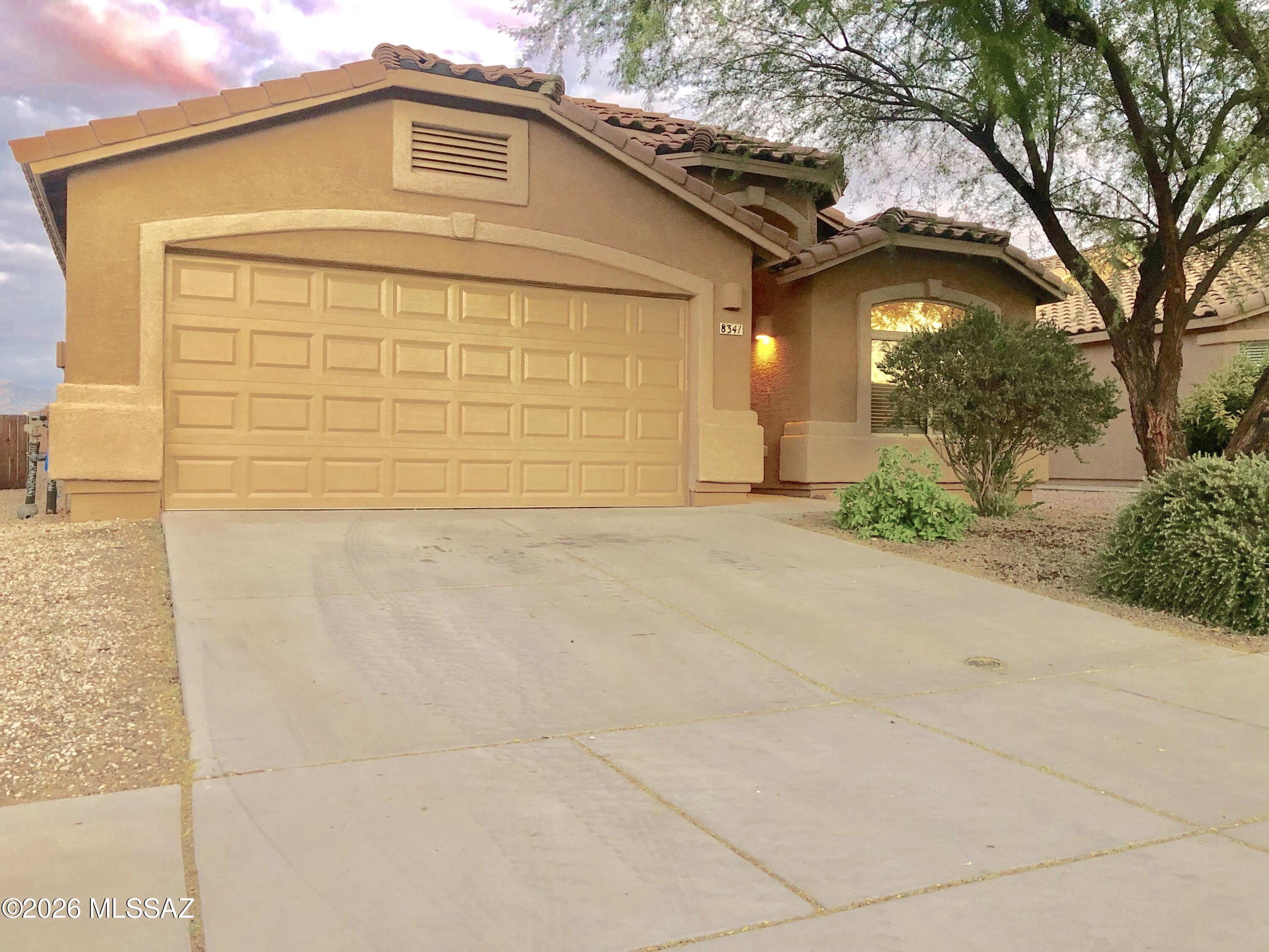 Clean & bright 4 bedroom 2 bath single story home backed up to state land with unobstructed sunrise mountain views! New energy efficient HVAC system installed March 2026! Featuring two spacious living areas, a large primary bedroom w/ walk-in closet, this home is finished with updated plank flooring, tiled entries, kitchen & bath, carpeted bedrooms, and two tone paint. Open kitchen with tiled backsplash, gorgeous countertops, island with seating, electric range, & single basin sink with disposal. Laundry room features gas & electric hookups. Access a community pool, dog park, playground & located  just minutes from groceries, restaurants, shopping, Vail Schools, & I-10!