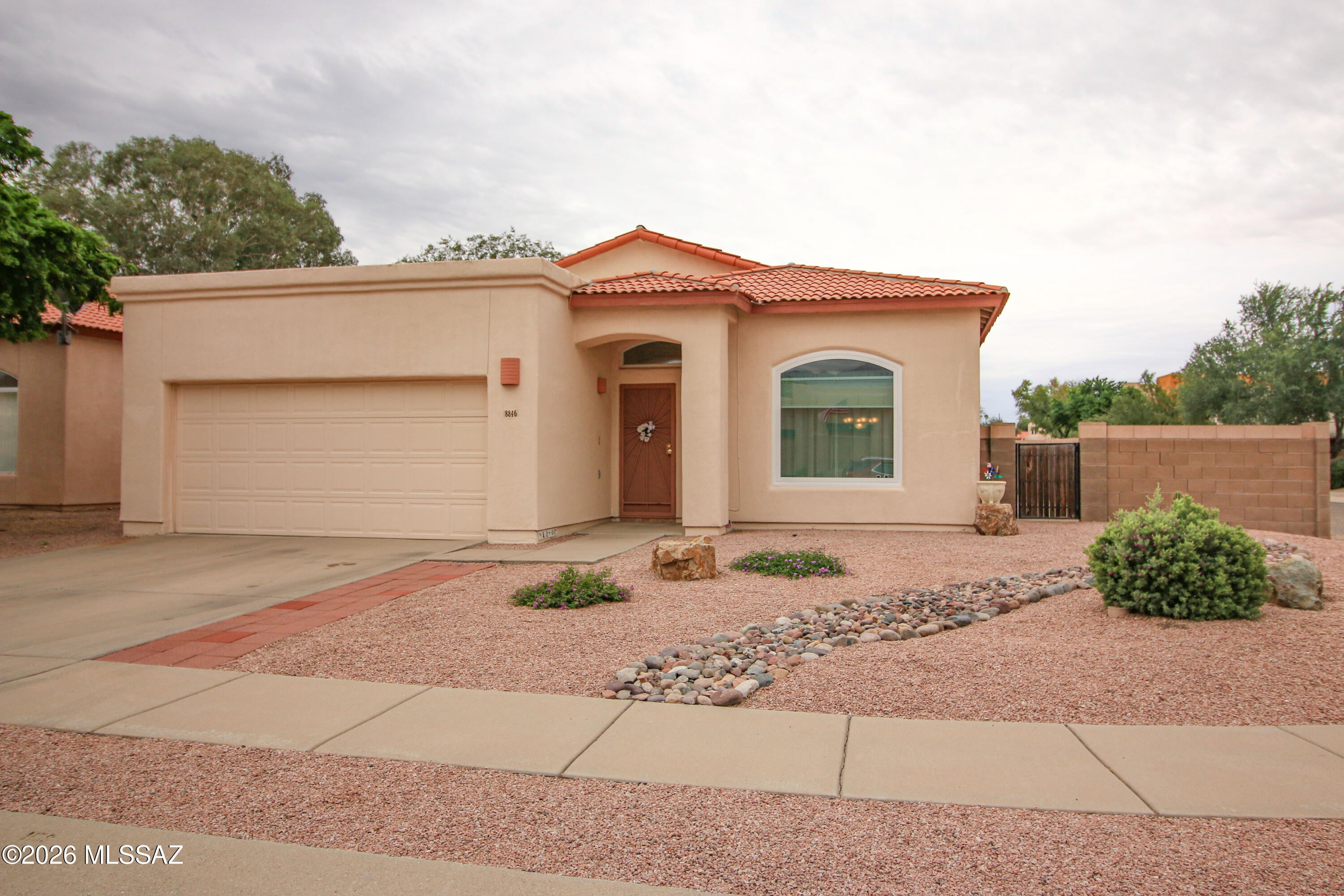 All appliances replaced in the past 3 years, including AC and water heater! This property is basically new in all of the ways it counts to your bank account. See complete list of upgrades in documents. Come inside to discover spacious living areas showcasing tile flooring, vaulted ceilings, carpet in all the right places, neutral palette, & arched doorways. The immaculate kitchen boasts a plethora of wood cabinets, granite counters, a pantry, track lighting, and a center island with a breakfast bar. Master bedroom features back patio access, a private bathroom with dual sinks, and a walk-in closet. Large back yard. Don't let this one get away.