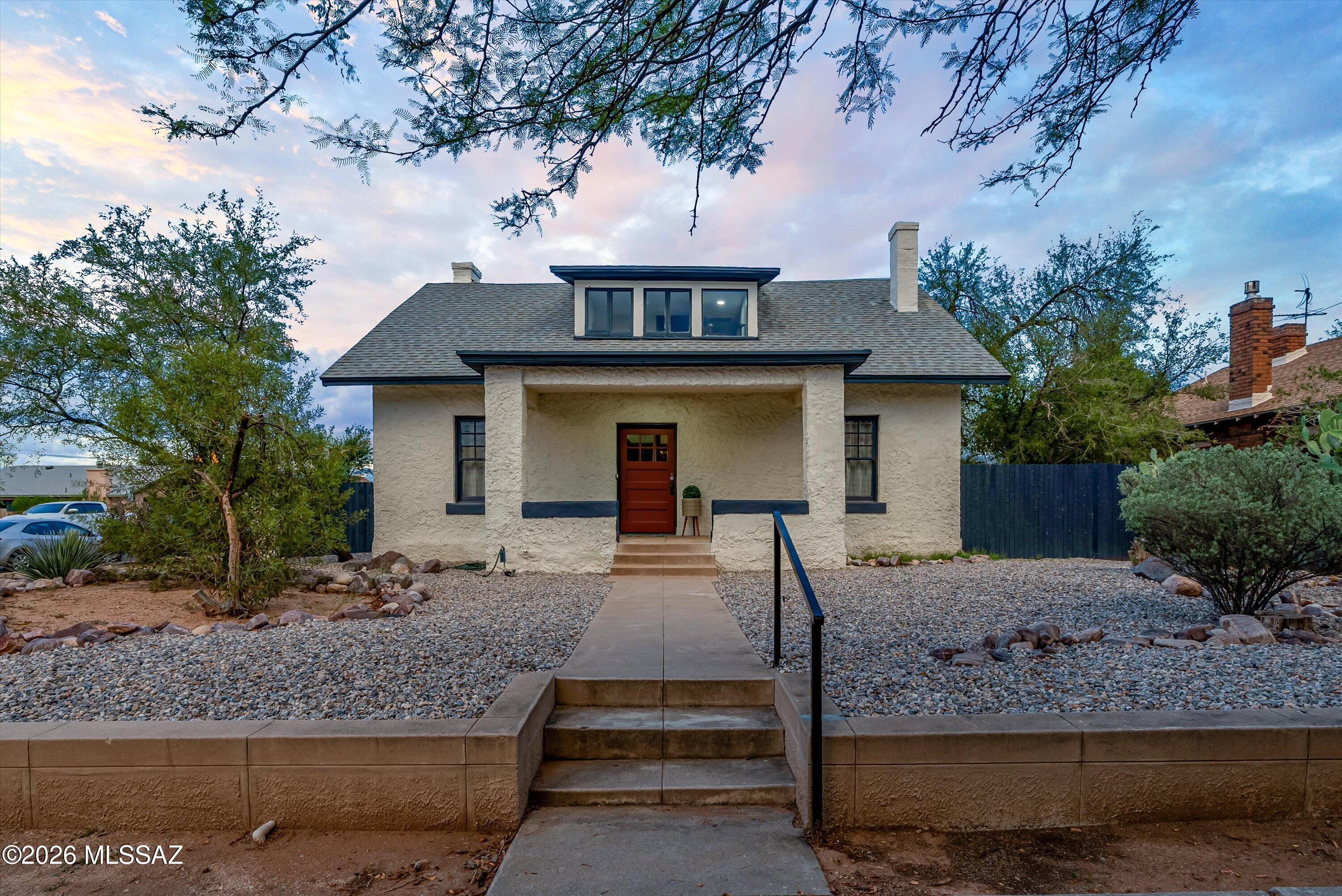 Range priced $774,900 -789,900. Own a piece of Tucson history just a short walk from the U of A! Located in the Historic West University neighborhood, this inviting home retains the character and craftsmanship of the early 20th century while offering important modern updates. Recent improvements include a new roof, HVAC system, water heater, plus updated flooring, and updates to the kitchen and baths. The kitchen features quartz countertops, stainless steel appliances and a classic apron-front sink. Outside, enjoy a spacious, fully fenced backyard with a rolling gate for convenient off-street parking. A fenced swimming pool, shady ramada & mature trees add comfortable outdoor living space. Historic charm, thoughtful updates and a great location come together in this move-in ready home