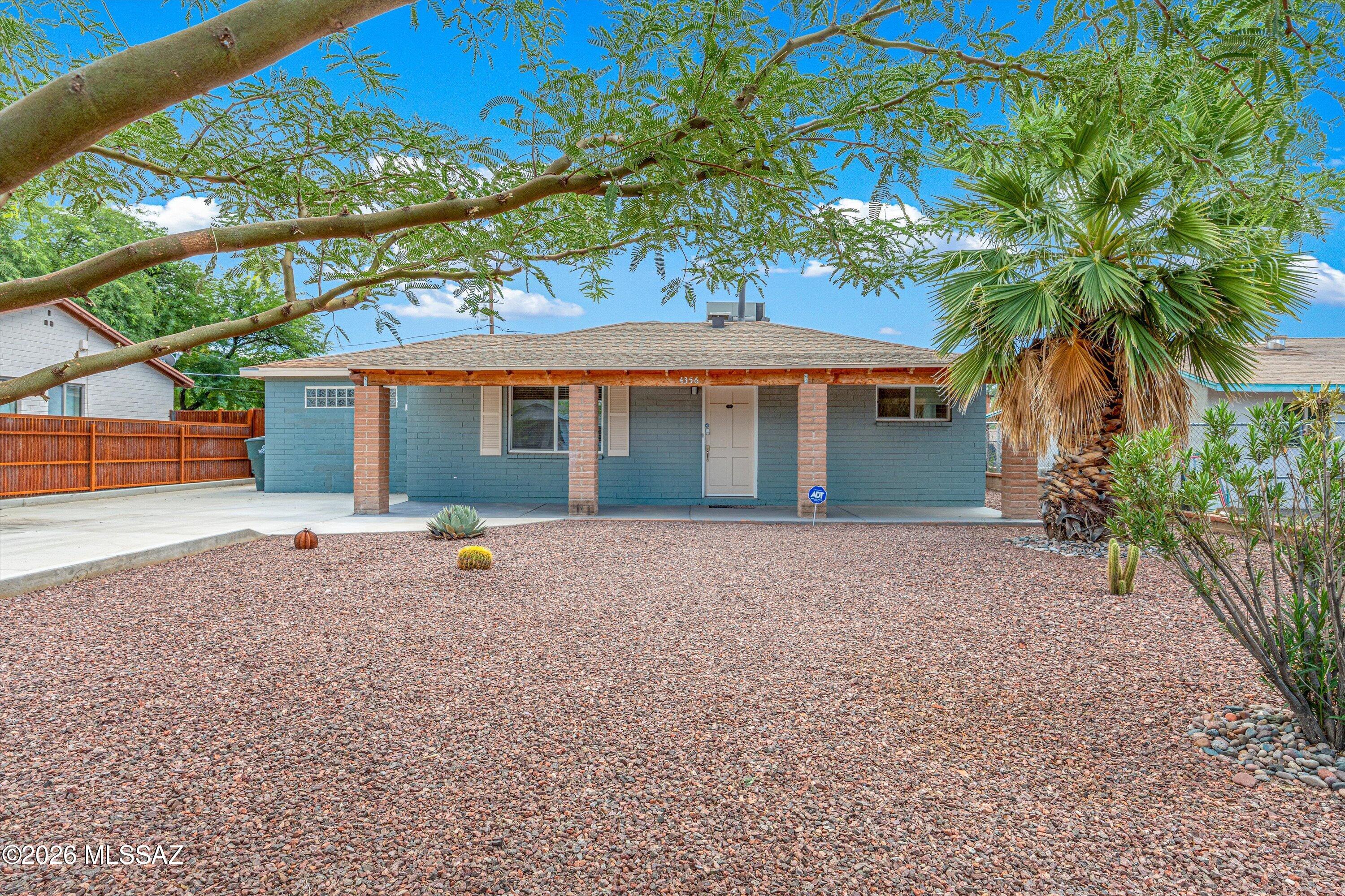 Range Priced seller to consider offers between $315K-$325K. Wonderful opportunity for buyer looking for move-in ready or investment. Thoughtfully updated & on a generous sized lot. 3 bedrooms and 2 baths split floor plan. Just perfect!  Updates will not disappoint. Ample parking for multiple vehicles in driveway and back yard through large gate: ideal for RV parking, trailers, all the toys or room for a court, a pool or whatever a buyer desires. This home is currently operating as a short-term rental, and may continue to be utilized as an income-producing Air-BNB. Move-in-ready and available fully furnished.