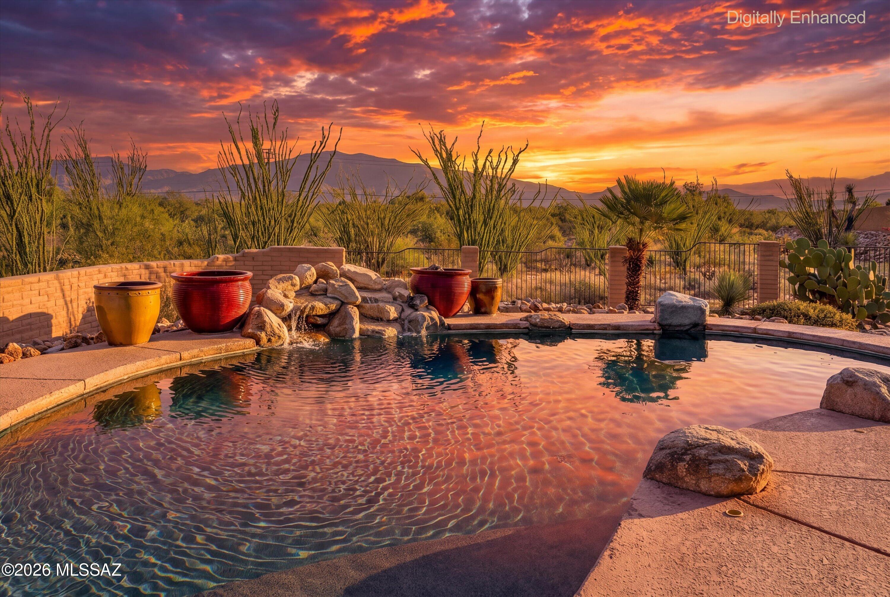 Back on the market and ready for its next owner. This single-level Whisper Ranch home sits on an acre corner lot with natural open space behind a view fence and clear Rincon Mountain views. 4 bedrooms, 3 baths, and 2,448 square feet of single-level living. The kitchen has upgraded counters and backsplash, 48 inch cabinets, slide-out lowers, and a center island. Warm up by the kiva fireplace, then unwind in a primary suite with jetted tub, walk-in shower, walk-in closet, and double vanity. The backyard is built for Arizona: pool, extended patio, outdoor kitchen, fountain, easy-care turf, and fruit trees on irrigation. Newer stainless appliances convey. Custom security doors, 3-car garage, low HOA, and top Vail Unified schools