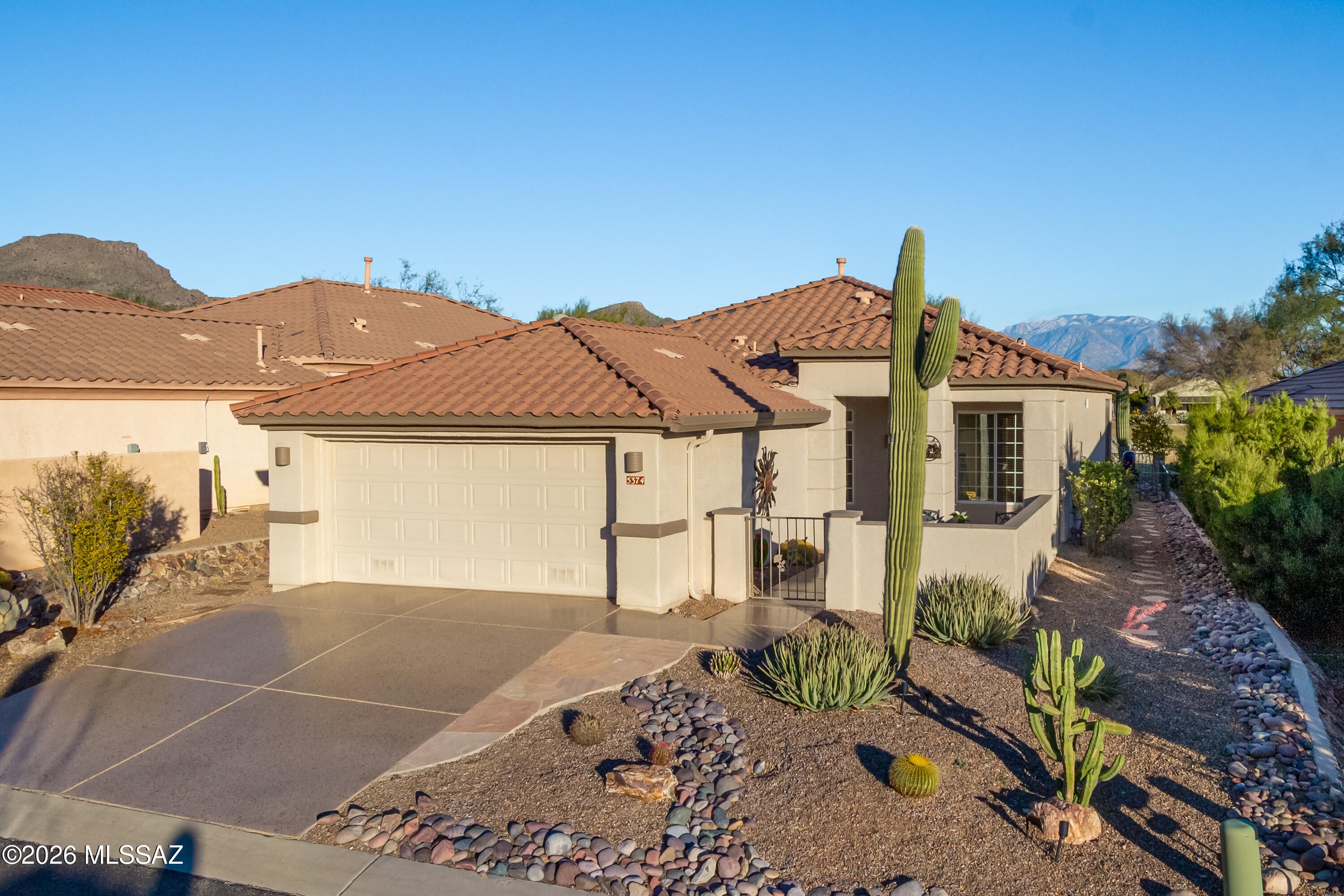 Beautiful Golf Course Home with Sunrise Views! 

Welcome to this stunning golf course home offering breathtaking Catalina views and peaceful morning sunrises. This thoughtfully designed residence features 2 spacious bedrooms, 2 full bathrooms, and a versatile office/den, perfect for working from home or hosting guests.

Enjoy the open, light-filled living spaces enhanced by tile flooring throughout and numerous upgrades that add both style and comfort. The home is perfectly positioned to capture sweeping golf course views, creating a serene backdrop for everyday living and entertaining.

Step outside to an inviting outdoor lounge area, ideal for year-round enjoyment, complete with a fire pit, BBQ, and low-maintenance turf--perfect for relaxing evenings or entertaining guests