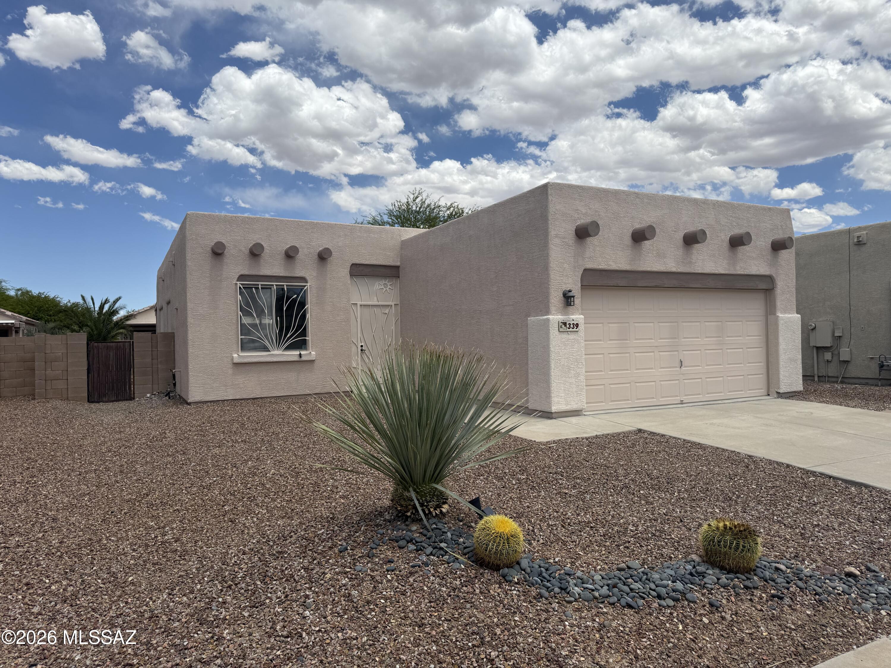 Sellers are licensed real estate agents in Arizona. Welcome home to this beautifully updated 3 bedroom, 2 bath property featuring 1345 sf of bright and inviting living space with 2-car garage. Recent improvements include fresh interior and exterior paint, updated fixtures, new ceiling fans, and a new water heater. The kitchen has been refreshed with a new sink, faucet and disposal. All appliances stay, including refrigerator, washer/dryer. Roof has been serviced and comes with a 5-year warranty. Fully landscaped front/backyards. Covered patio in back with extended brick pavers. Enjoy the community pool/spa, basketball court and children play area/park -all with no GVR and no age restriction!