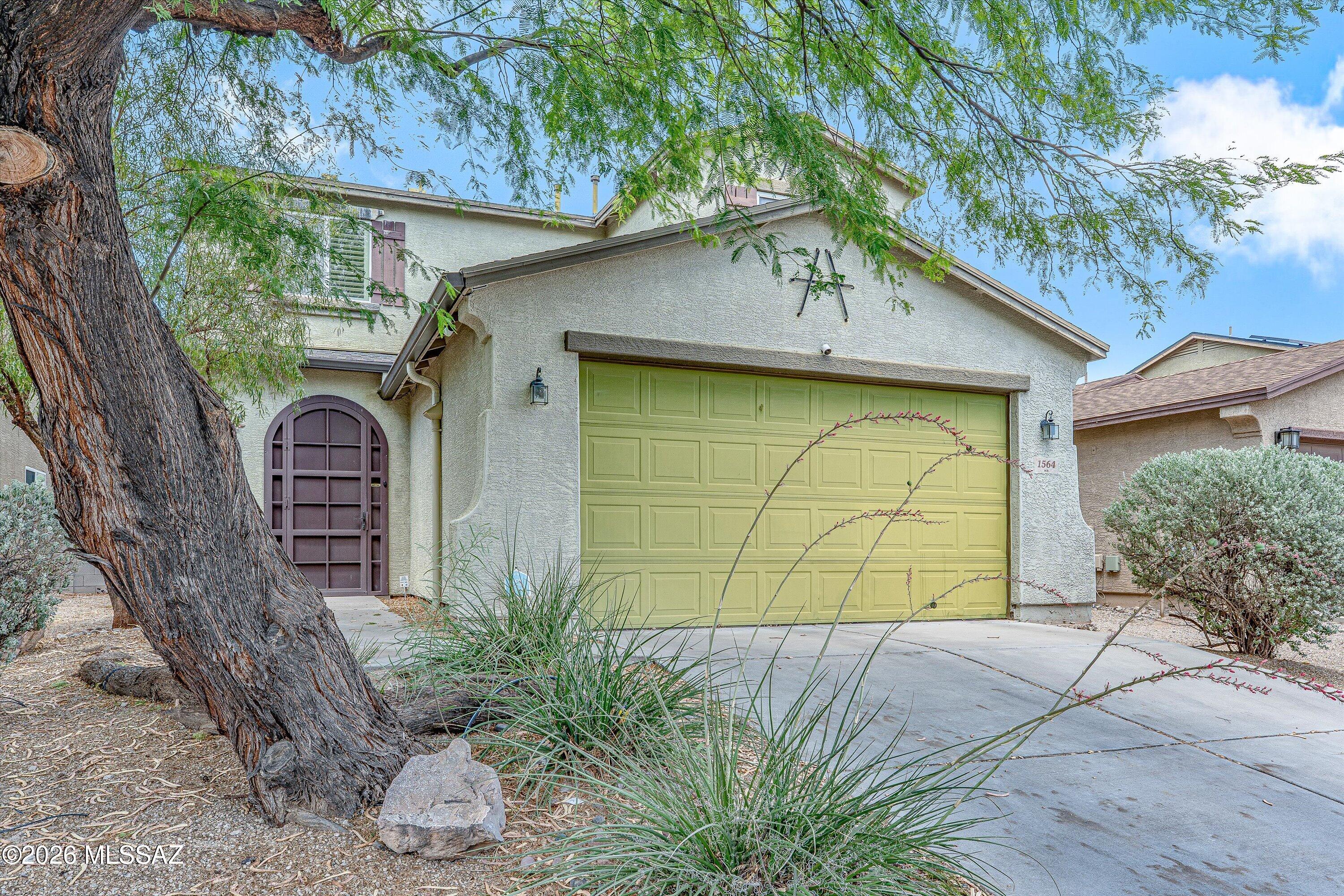 Nestled in desirable Starr Pass Heights near the foothills of 'A' Mountain, this 2-story, 3-bed/2-bath home offers 1,813 sq. ft. of comfortable living. Enjoy a functional floor plan, covered patio, landscaped backyard with passive irrigation, mountain views, and a 2-car garage. Quick access to I-10, minutes from downtown Tucson, U of A, and the JW Marriott Starr Pass Resort. Seller will replace the roof prior to Close of Escrow -- move-in ready peace of mind included. Don't miss this Starr Pass Heights gem!
