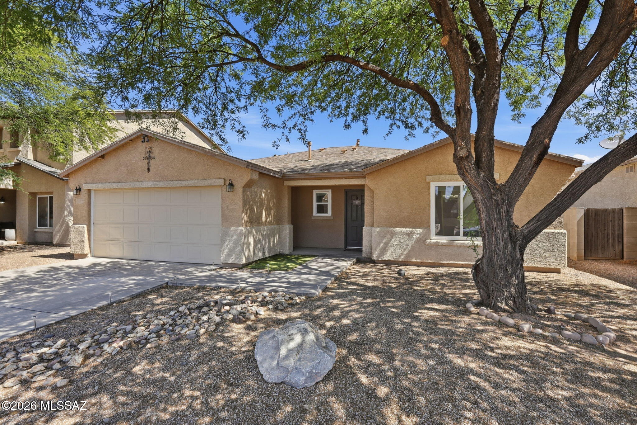 Exceptional home just minutes from DMAFB. Ideal for qualified buyers on an incredible Assumable VA Loan, the property features major recent updates including a brand-new water heater and new energy-efficient windows. Inside, enjoy incredibly spacious living areas and a massive dedicated laundry room for ultimate convenience. The heart of the home boasts a large kitchen complete with a central island that flows seamlessly into a generous dining space, making it perfect for hosting family dinners. Step outside into your private backyard oasis, beautifully primed for outdoor entertaining. The sparkling pool is ready for summer fun, featuring a brand-new skimmer, new waterlines, and a new auto-fill system for entirely stress-free maintenance. This is a move-in-ready gem!