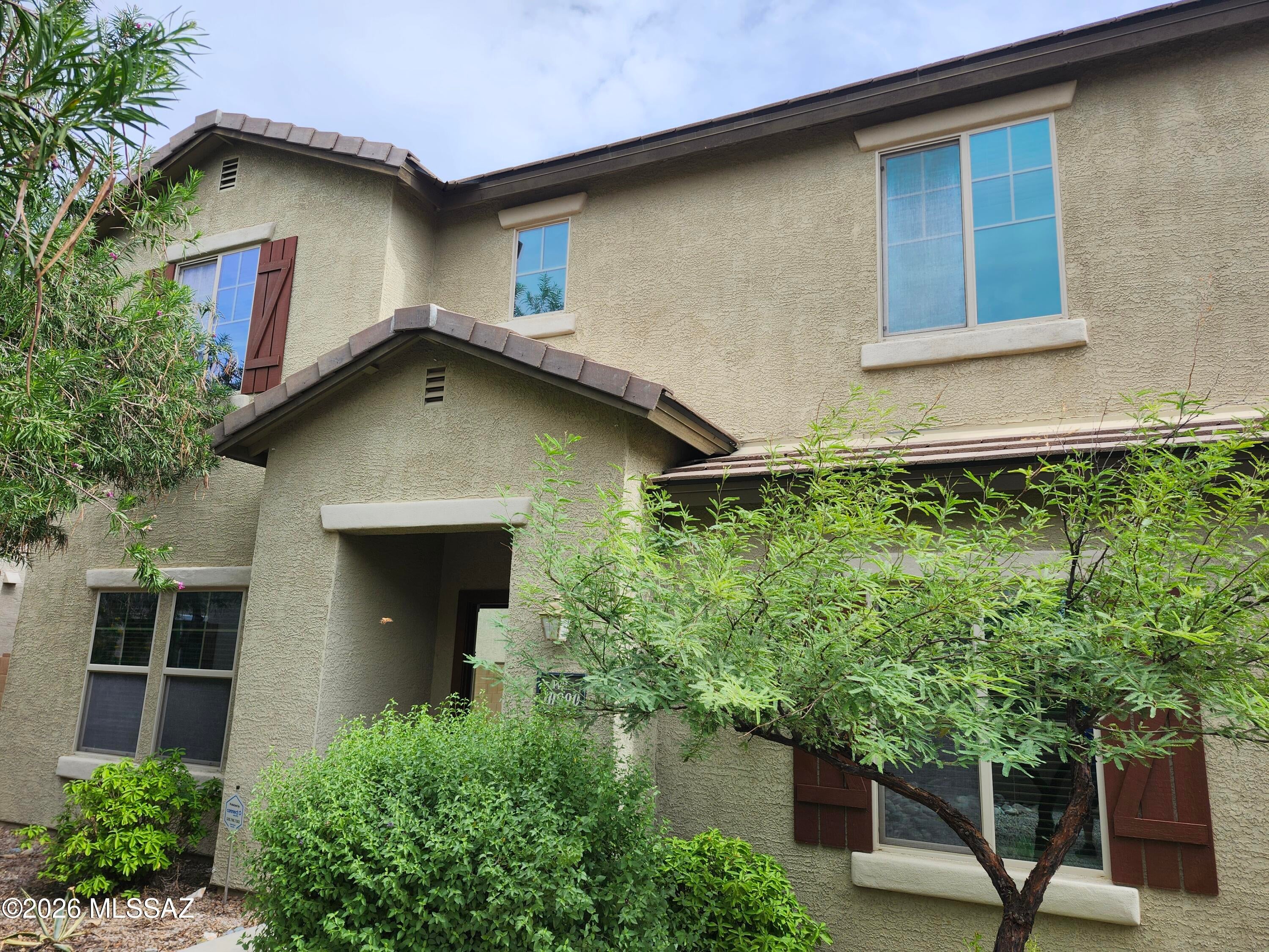 Welcome to this beautifully appointed 3-bedroom, 2.5-bathroom home in the sought-after Sierra Morado community! Thoughtfully designed with spacious living areas, stylish finishes, and energy-efficient features--including SOLAR panels--this home offers the perfect blend of comfort, convenience, and modern Arizona living. Step inside to an inviting open-concept floor plan filled with natural light. The spacious living area features a triple-slider door that seamlessly connects the indoor living space to the backyard. A versatile den/office provides the perfect space for working from home, studying, or creating a quiet retreat. The gourmet kitchen is the heart of the home, featuring solid granite countertops, designer cabinetry, stainless-steel appliances, a walk-in pantry, and a large center island with breakfast bar--perfect for casual meals or entertaining guests. The spacious primary suite offers a private retreat with a large walk-in closet, dual-sink vanity, and relaxing soaking tub. Upstairs, you'll find a convenient laundry, additional bedrooms and a generous loft that can easily be transformed into a media room, reading lounge, home office, or additional living space. Step outside and enjoy the beautiful Arizona weather from the covered rear patio with an Aluma-Wood lattice cover. The professionally landscaped front yard creates wonderful curb appeal, while the low-maintenance desert landscaping in the backyard makes outdoor living easy to enjoy. Located in the desirable Sierra Morado community, residents have access to nearby parks and the community center with pool. The home is also conveniently located within the Vail School District, with easy access to Davis-Monthan Air Force Base, Tucson International Airport, and I-10.