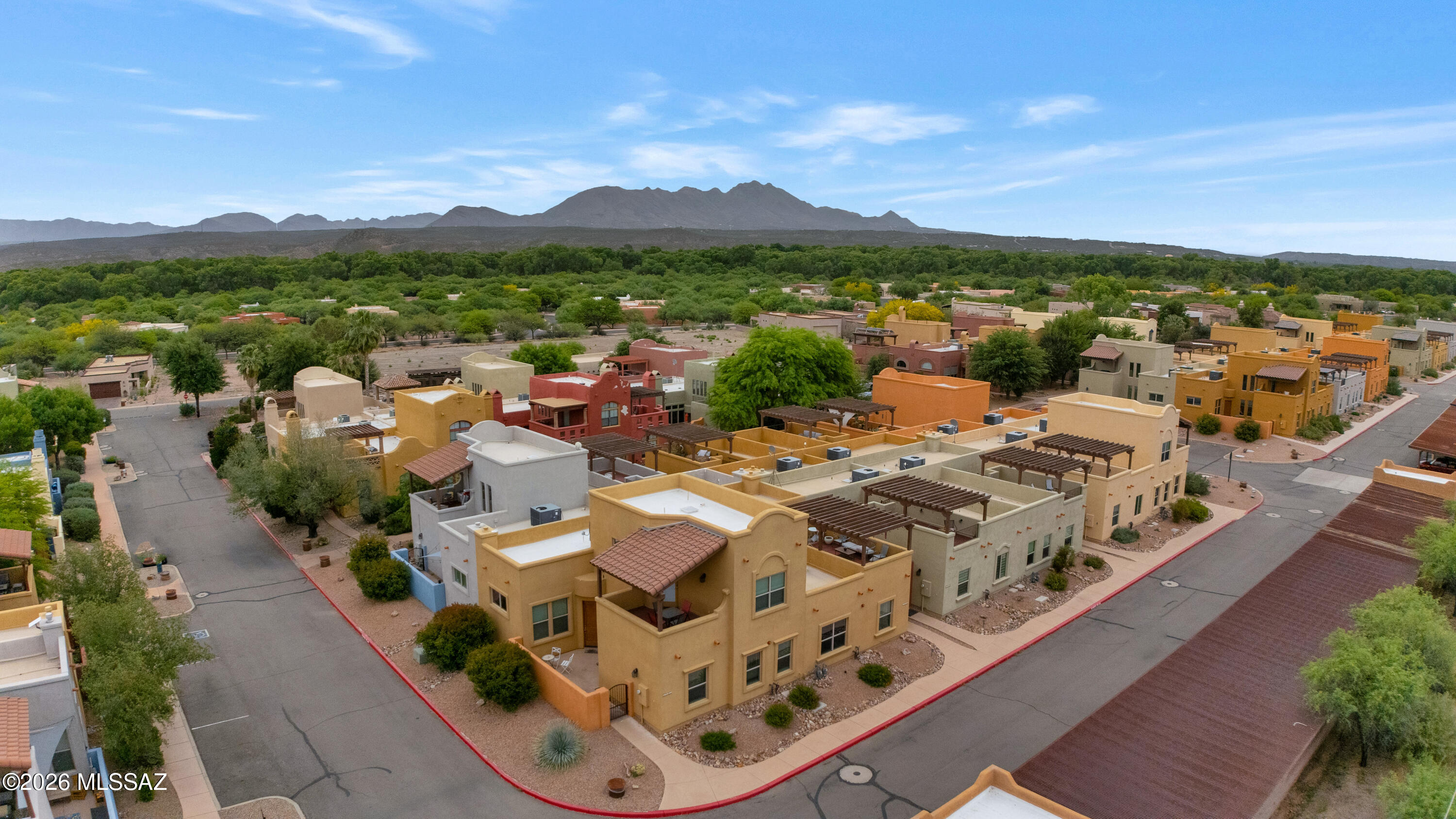 Darling two bedroom, two bath townhome in the heart of Barrio de Tubac's Master planned Barrio Embarcadero. Fabulous rooftop/sky deck that looks over the gorgeous Tubac/Santa Cruz River valley & provides the most glorious sunrises & sunsets.... Not to mention enjoy the dark night skies of Southern Arizona! This smart 2/2 has a beautiful great room with a beehive gas fireplace & open flow. Both bedrooms are spacious and private. Beautiful natural light filled home with tile floors throughout. No wasted space here! Plus move in condition! 
Barrio Embarcadero has resort style amenities to include pool, spa & gym within the community to enjoy. 
Plus you're minutes away from the charming village of Tubac, golf, shopping, fabulous restaurants and sweeping vistas in every which direction!