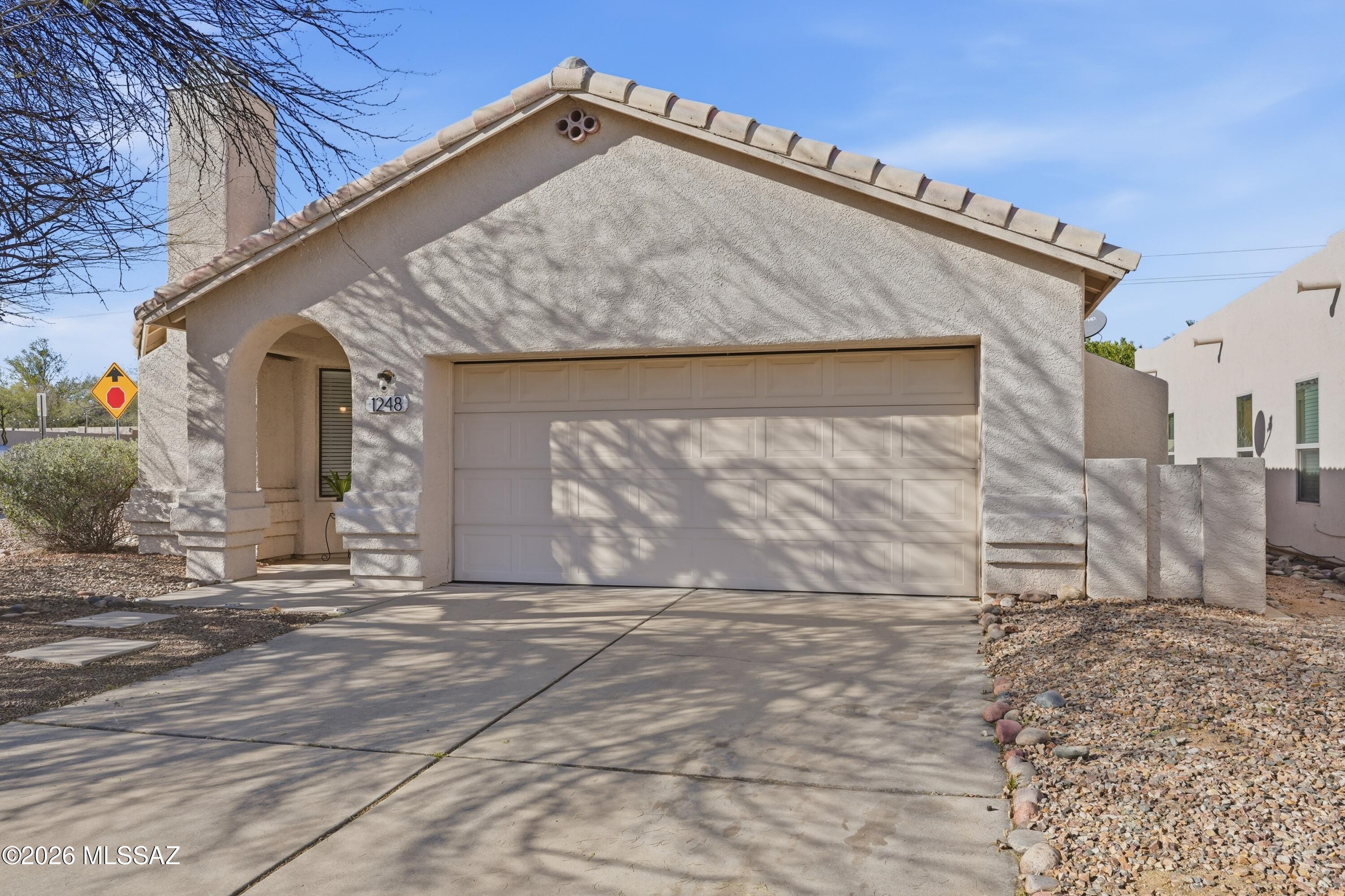 Beautiful home on a corner lot in the highly desirable Copper Creek neighborhood. This 1250 sq ft home features 3 bedrooms with 2 bathrooms. Updated kitchen with stainless steel appliances and quartz counter tops. Updated bathrooms. Vinyl flooring in main areas with carpeted bedrooms. Vaulted ceilings. Cozy fireplace in living room. Covered patio space. Located close to shopping, restaurants, parks, hiking & biking on the loop. Come see all this home has to offer!
