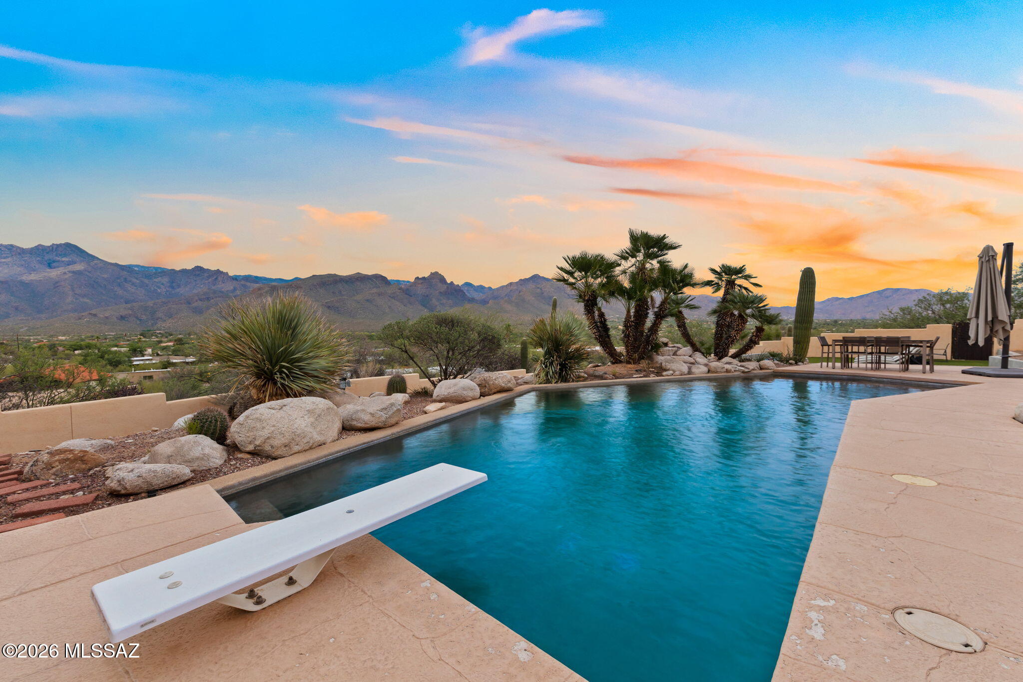 Sweeping unobstructed mountain views captivate you as soon as you walk in. Enjoy the views inside or from the resort like pebble tec pool. Thoughtfully designed split bedroom plan promotes function, privacy if needed with views always in mind. The great room is open to the updated kitchen with island, granite countertops, ss appliances and pantry. The Master bedroom includes a sitting area and private patio. The master bath has separate vanities, jacuzzi tub, shower and full size sauna. Separate walk-in closets. The large family/rec room can be closed off for privacy and is adjacent to two more bedrooms and bathroom. Large private lot with concrete driveway, 3 car garage with lots of built-in storage.  Listing agents are related to the seller.