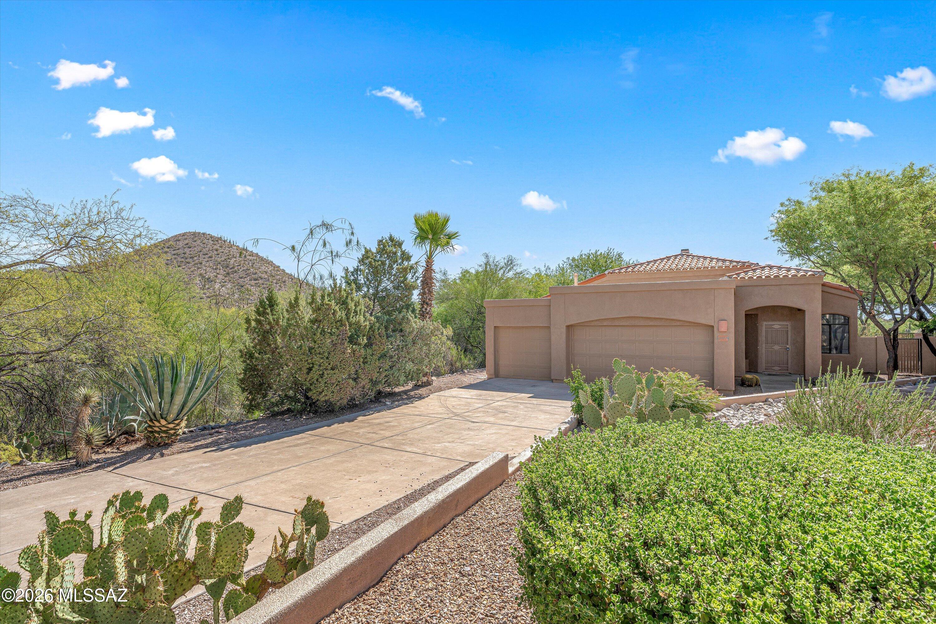 Welcome to this beautifully maintained 3-bedroom, 2-bath home offering 1,829 sq. ft. and a spacious 3-car garage, ideally situated along the Rattler course at The Club at Starr Pass. Located just off the 2nd tee box, this property combines scenic desert golf views with privacy and tranquility. The home has been freshly painted inside and out and features major system updates, including a newer HVAC and water heater, along with a roof replaced just four years ago--providing peace of mind for years to come. Enjoy resort-style living just minutes from JW Marriott Tucson Starr Pass Resort & Spa, offering world-class golf on the Arnold Palmer Signature Course, plus dining and spa amenities. Outdoor enthusiasts will love the proximity to hiking and biking trails, including Tumamoc Hill. Conveniently located with easy access to I-10, downtown Tucson, shopping, dining, and the Mercado District, Raytheon, and Tucson Airport. This home offers the perfect blend of comfort, location, and lifestyle.