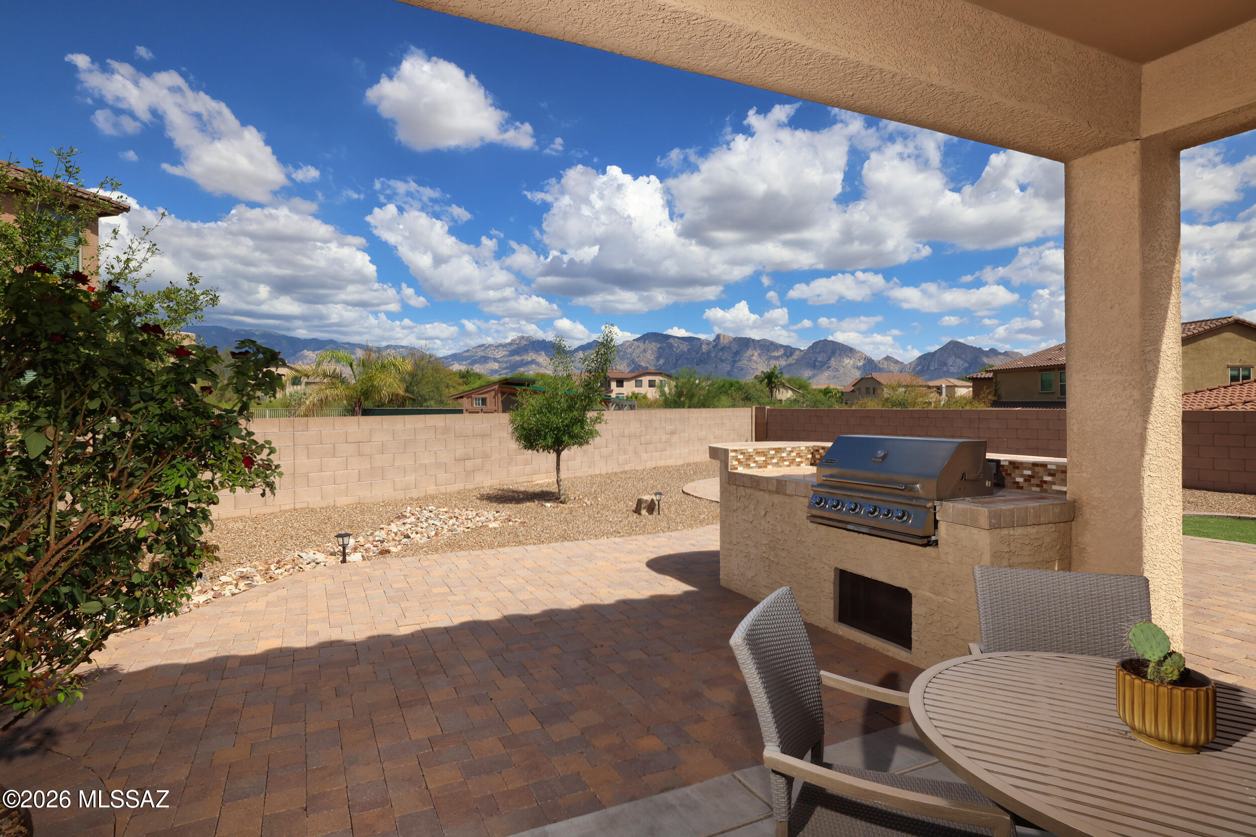 Wake up to unmatched Catalina mountain views from this beautifully maintained 3BD/2BA home on a premium oversized corner lot tucked into a quiet half cul-de-sac in desireable Rancho Vistoso. The open floorplan features high ceilings, a spacious kitchen with granite countertops, upgraded cabinetry, SS appliances, breakfast nook & bar. The primary suite offers an elegant bay window & private en-suite bath. Step outside to your own AZ retreat featuring a covered patio, built-in gas BBQ, firepit and ample space to relax & entertain while enjoying the breathtaking mountain views. Recent upgrades include a water heater and brand new carpet. This exceptional home combines comfort & privacy with a spectacular setting in Oro Valley. Parks, walking trails, amenities all nearby.