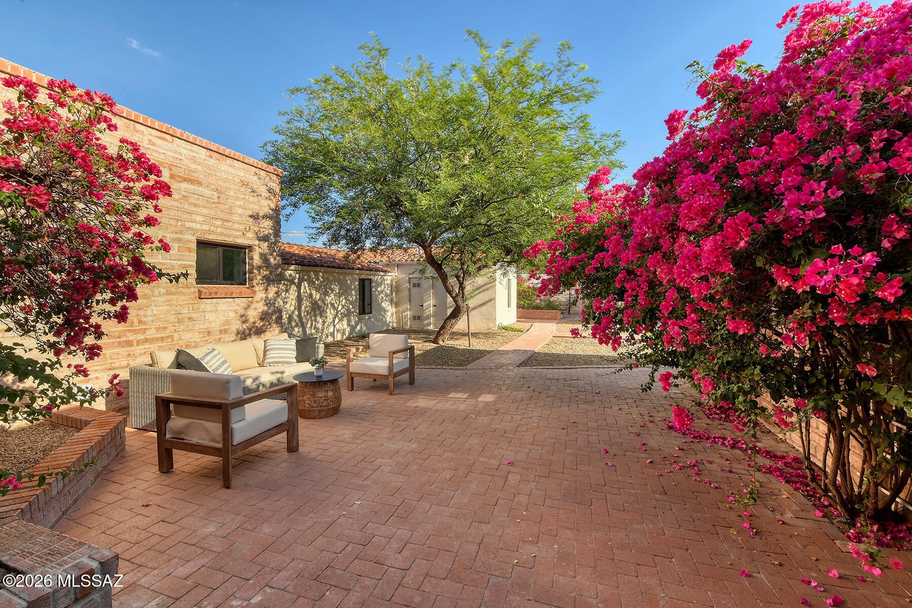 Exceptional Central Tucson Opportunity Thoughtfully Remodeled Home with Detached Guest House
Thoughtfully remodeled to preserve its original character while introducing a warm, timeless transitional design, this exceptional Central Tucson home beautifully blends historic charm with modern comfort.

Ideally located just minutes from Banner - University Medical Center Tucson, the University of Arizona, the Arizona Inn, downtown Tucson, and the area's premier dining, shopping, and cultural attractions, this property offers an unbeatable central location.

The approximately 3,490 sq. ft. residence features 5 bedrooms, including two private primary suites, offering exceptional flexibility for multigenerational living, guests, or work-from-home needs A detached guest house with its own private backyard entrance provides endless possibilities as a guest retreat, home office, creative studio, or potential rental opportunity.

The spacious, pool-sized backyard offers exceptional privacy and plenty of room to create your ideal outdoor oasis.

A rare opportunity to own a beautifully updated home in one of Tucson's most established and desirable neighborhoods, where classic Tucson character meets timeless transitional design.