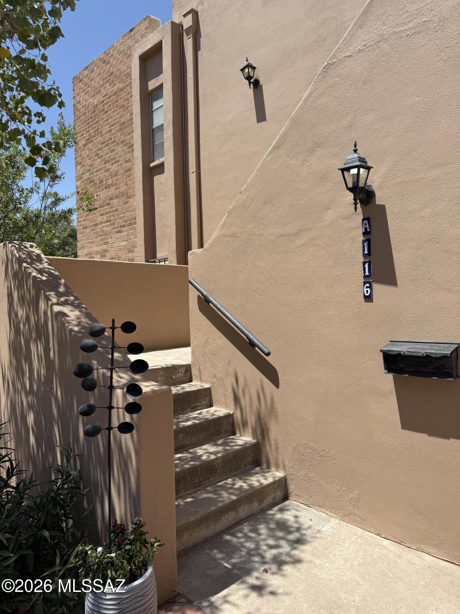 Great Opportunity, Ready to Move in! GOOD PRICE! Bright, spacious condo in a prime central Tucson location. Huge living area filled with natural light features a gas fireplace and sliders to a large private balcony. Every bedroom plus the dining room has its own balcony. Spacious kitchen with stainless steel appliances. Primary suite offers dual sinks and generous closet space. Back door and balcony overlooks the community pool w/ covered seating area. Includes 2 covered parking spaces and a private storage room. Close to shopping and dining & major cross streets.