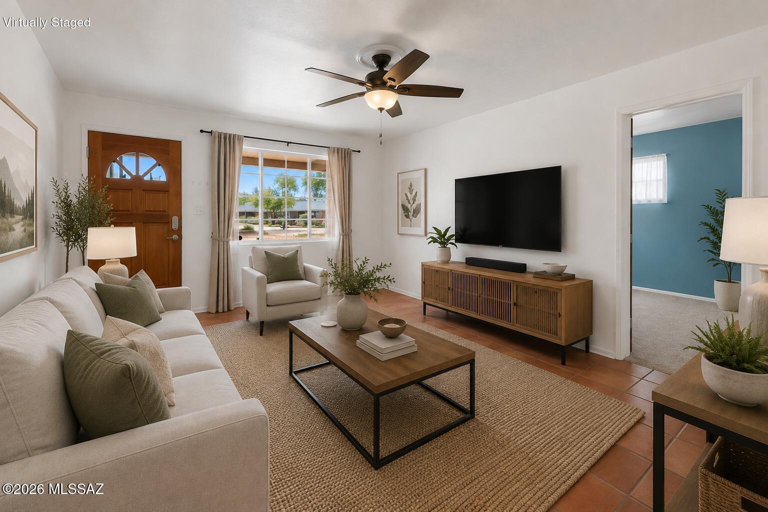 Built to last, this classic solid brick Central Tucson home offers timeless quality and modern updates. With 1,658 sq. ft., 3 bedrooms, 1.75 baths, and separate living and family rooms, there's space to relax and entertain. The spacious kitchen features a gas range, serving island, dining area, and easy-care ceramic tile flooring. Major improvements include a newer roof (4 years), PEX re-piping, tankless water heater, and a 1-year home warranty for added peace of mind. Enjoy a low-maintenance front yard and private enclosed backyard. Conveniently located near shopping, dining, Hoffman Park, and just 5 miles from the University of Arizona.  If you've been searching for a home with solid construction, lasting value, and room to make it your own, this historic gem deserves a closer look.
