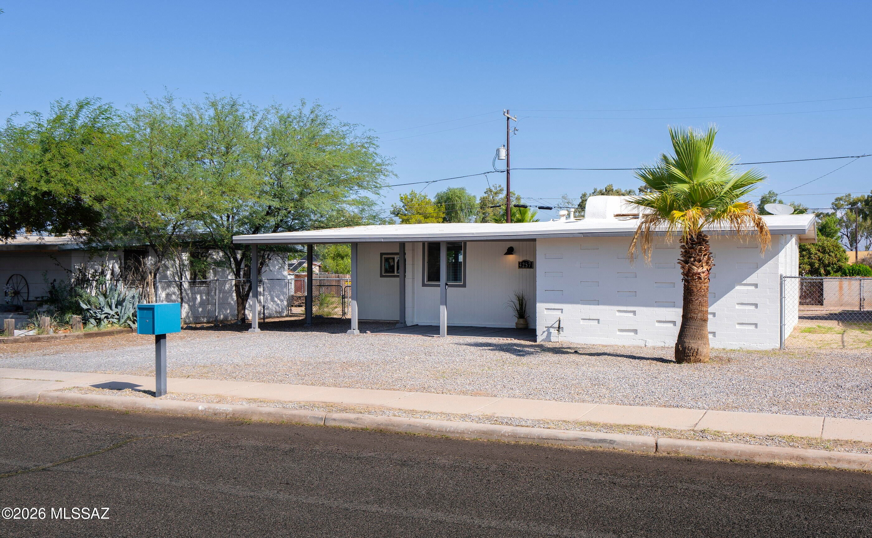 Beautiful 3-bedroom, 2-bath home offering 1,084 sq. ft. of comfortable living space. Thoughtfully updated and ready for its next owner, this home features fresh interior paint, refreshed fascia, a foam roof, and a power-washed exterior.
Inside, there is no carpet, making the home easy to maintain. The kitchen offers dual sinks, a disposal, and stainless-steel appliances. French doors open to the backyard, creating a seamless connection between the indoor and outdoor spaces. Additional features include an indoor laundry room, ceiling fans throughout, and dual-pane low-E windows.
The low-maintenance backyard includes double gates, providing access for RV parking, along with a 1-car carport. No HOA. Near Davis-Monthan Air Force Base, freeway, shopping, and stores. Move in ready!