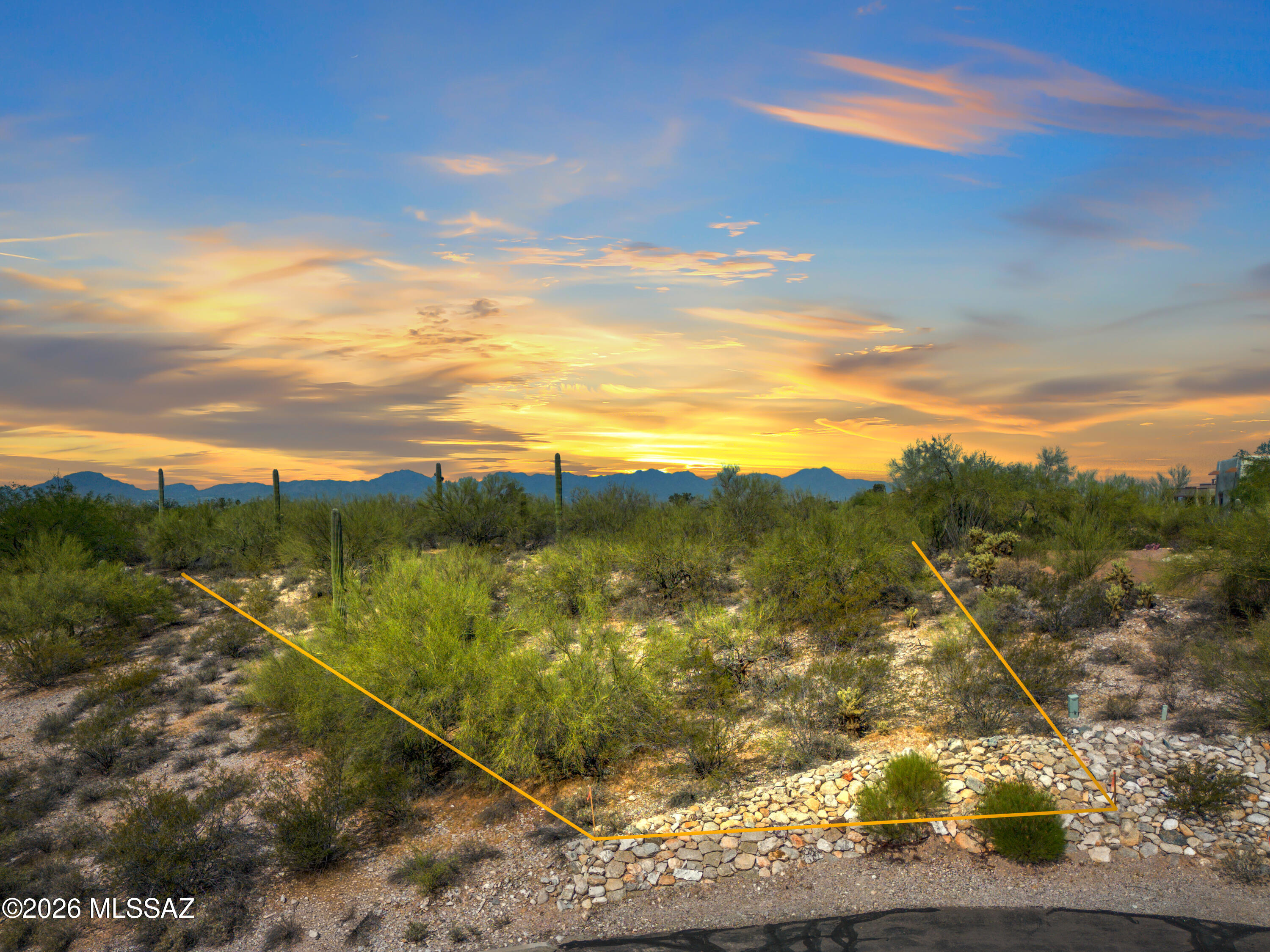 Enjoy one of the last vacant lots in the prestigious guard-gated community of Hacienda Del Sol Estates in the Catalina Foothills. This exceptional 1.44-acre lot offers ample space to design and build a custom luxury home. Surrounded by majestic saguaros and lush native desert vegetation, this homesite features stunning mountain and city views. Combining privacy, natural beauty, and convenience, the property is ideally located near outdoor recreation, dining, and shopping, all within the highly regarded Catalina Foothills School District.