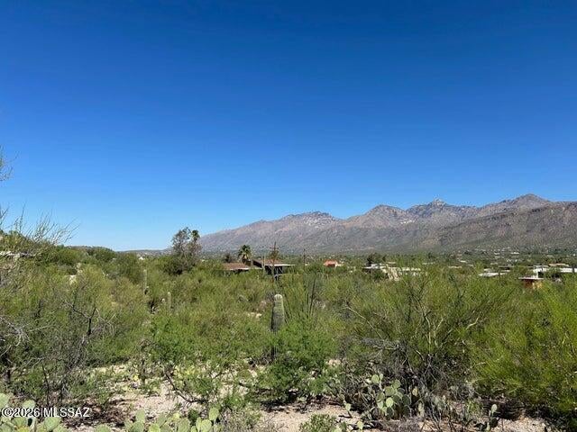 Don't miss this rare opportunity to own 3.56 pristine acres. Located just off Catalina Highway-the scenic gateway to Mt. Lemmon. This lot offers breathtaking 180 degree views of the Catalina  Mountains to the north, with multiple potential building sites to maximize your vision. Horse friendly with stable on low, flat portion and home above. All utilities are already at the lot line, making this a ready to build home site. Whether you're dreaming of a custom desert retreat or a family estate, this expansive parcel provides the space, setting and scenery to make it a reality. Enjoy year-round outdoor adventures just a short drive away with hiking, biking, camping, fishing, and snow skiing on Mt Lemmon. Check comps-GREAT PRICE FOR AREA.