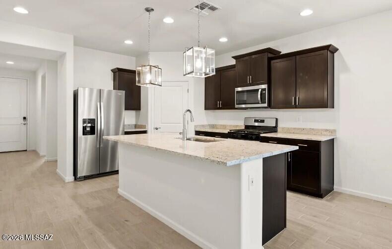 Discover the perfect blend of space and comfort in this beautiful 4-bedroom, 3-bath home! The versatile teen room offers the ideal flex space for a media room, game room, homework station, or second living area. Retreat to the private primary suite featuring dual sinks and a spacious walk-in closet. Located in Sunset Crest at Ajo & Kinney, you'll enjoy a peaceful desert lifestyle with community amenities including a playground, picnic tables, and shaded ramadas designed to bring neighbors together. Built with innovative, energy-efficient features, this home delivers lasting comfort, potential savings, healthier living, and the peace of mind you deserve.