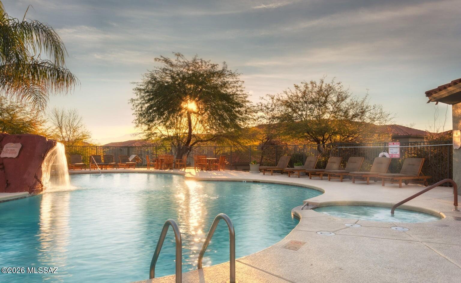 Updated, modern, condo with private patio. Don't miss out on the opportunity to own in this gated community in the foothills! Amenities include: clubhouse, pool, spa, fitness room, covered parking, and more! Minutes to upscale dining, shopping, and the beautiful Sabino Canyon! AC and water heater replaced in 2022. Unit is very well maintained! Call for your showing today!!