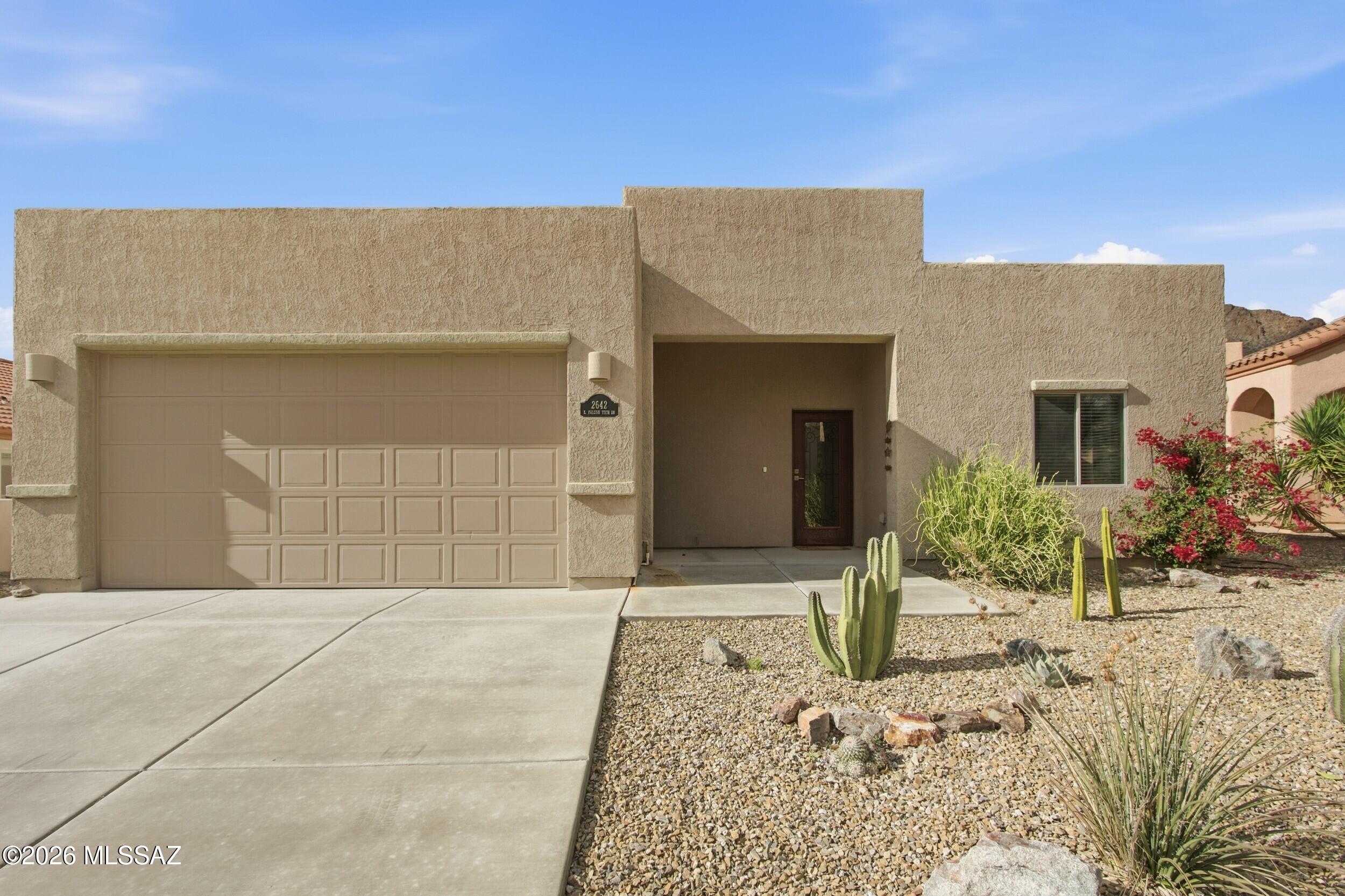 Experience an incredible opportunity to own one of the newest and most energy‑efficient homes in the neighborhood. Perfectly nestled against the breathtaking Tucson Mountains, this thoughtfully designed residence offers both modern comfort and a serene natural backdrop. Inside, you'll find soaring ceilings and an open‑concept kitchen and living area, anchored by a spacious island ideal for entertaining or simply enjoying the sweeping mountain views.
What truly sets this home apart is its fully paid‑off solar system, delivering long‑term energy savings, reduced utility costs, and a lighter environmental footprint from the moment you move in. It's a rare blend of contemporary design, sustainability, and unbeatable Tucson scenery.