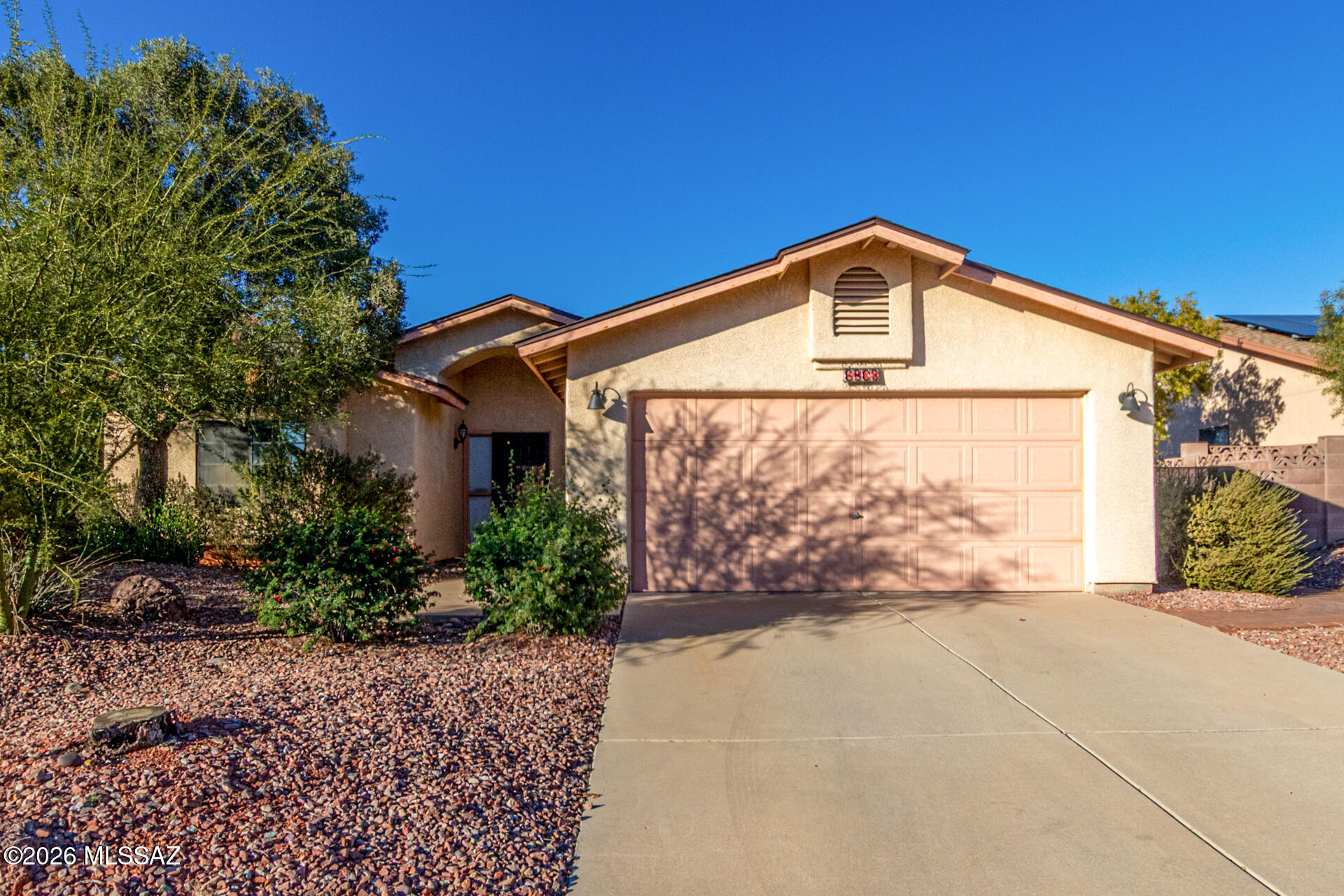 Welcome to this beautiful 3-bedroom, 2-bath home ideally located on the NW side of town. Step inside to soaring vaulted ceilings and a bright, open feel complemented by tile and wood flooring throughout. The desirable split floorplan offers privacy and functionality, perfect for everyday living. Enjoy peace of mind with a newer roof and HVAC, and appreciate the added space of the extended 2-car garage. Out back, you'll find a huge rear yard designed for relaxation and entertaining, featuring a covered patio and a tranquil pond—a true backyard retreat. Conveniently located near shopping, dining, and outdoor recreation, this home offers comfort, space, and charm in a sought-after location.