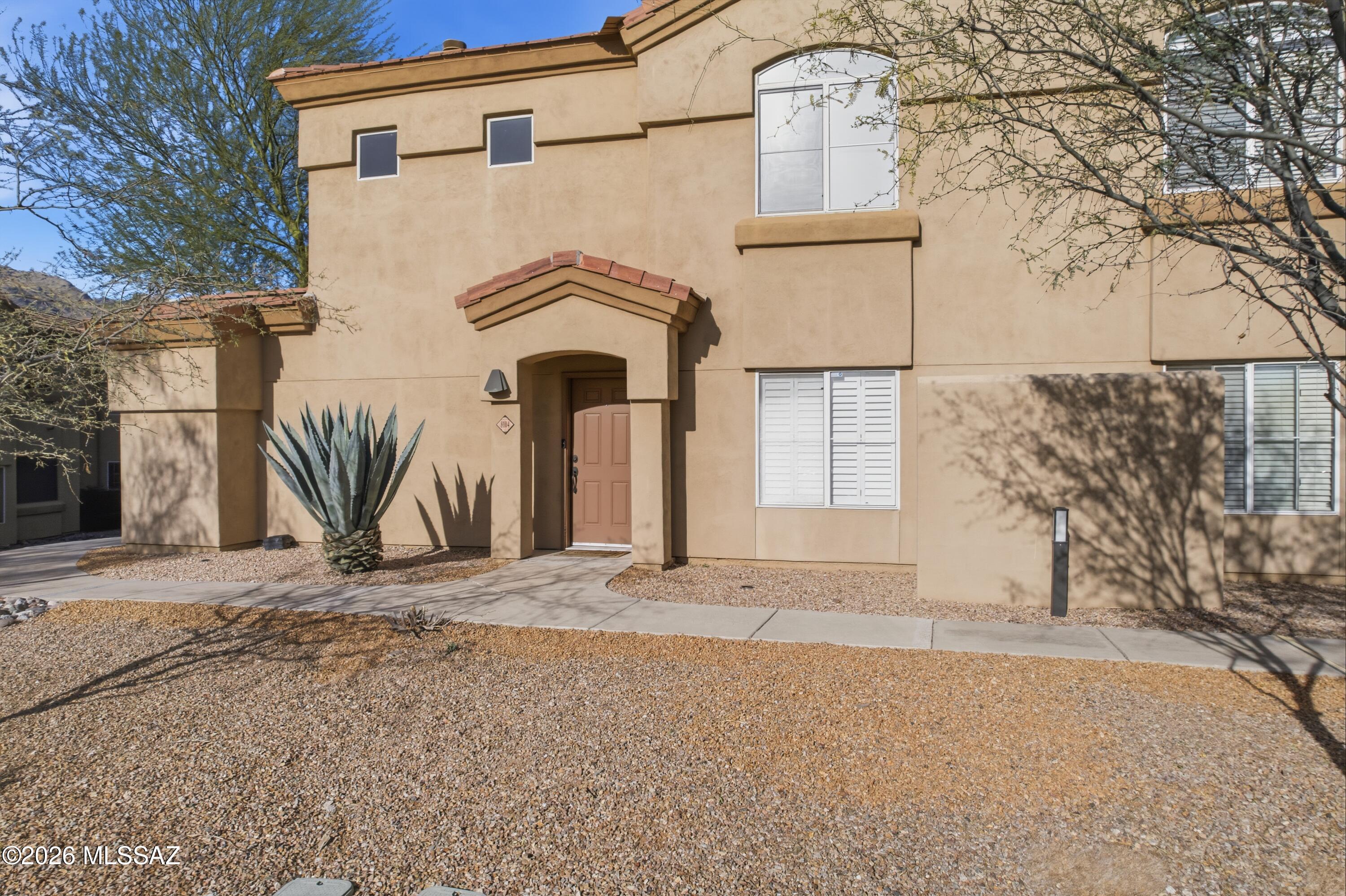 Quaint, well-maintained, fully furnished Pinnacle Canyon condo in the heart of the coveted Catalina Foothills.  This 1,048 square foot 2B/2B gem boasts granite countertops, stainless steel appliances, and newer kitchen cabinets as well as plantation shutters throughout, gas fireplace, and a detached garage.  Perfectly situated in the award-winning Catalina Foothills A+ school district, and just a few miles from the Sabino Canyon Recreation Area, Canyon Ranch Resort/Spa, world-class hiking/biking, fine dining/shopping, and golf.  Amenities include gated entry, heated Pebble Tec resort-style pool and spa, exercise facility, and EV charging stations.  Don't miss this unique opportunity to own a personal slice of Foothills paradise!