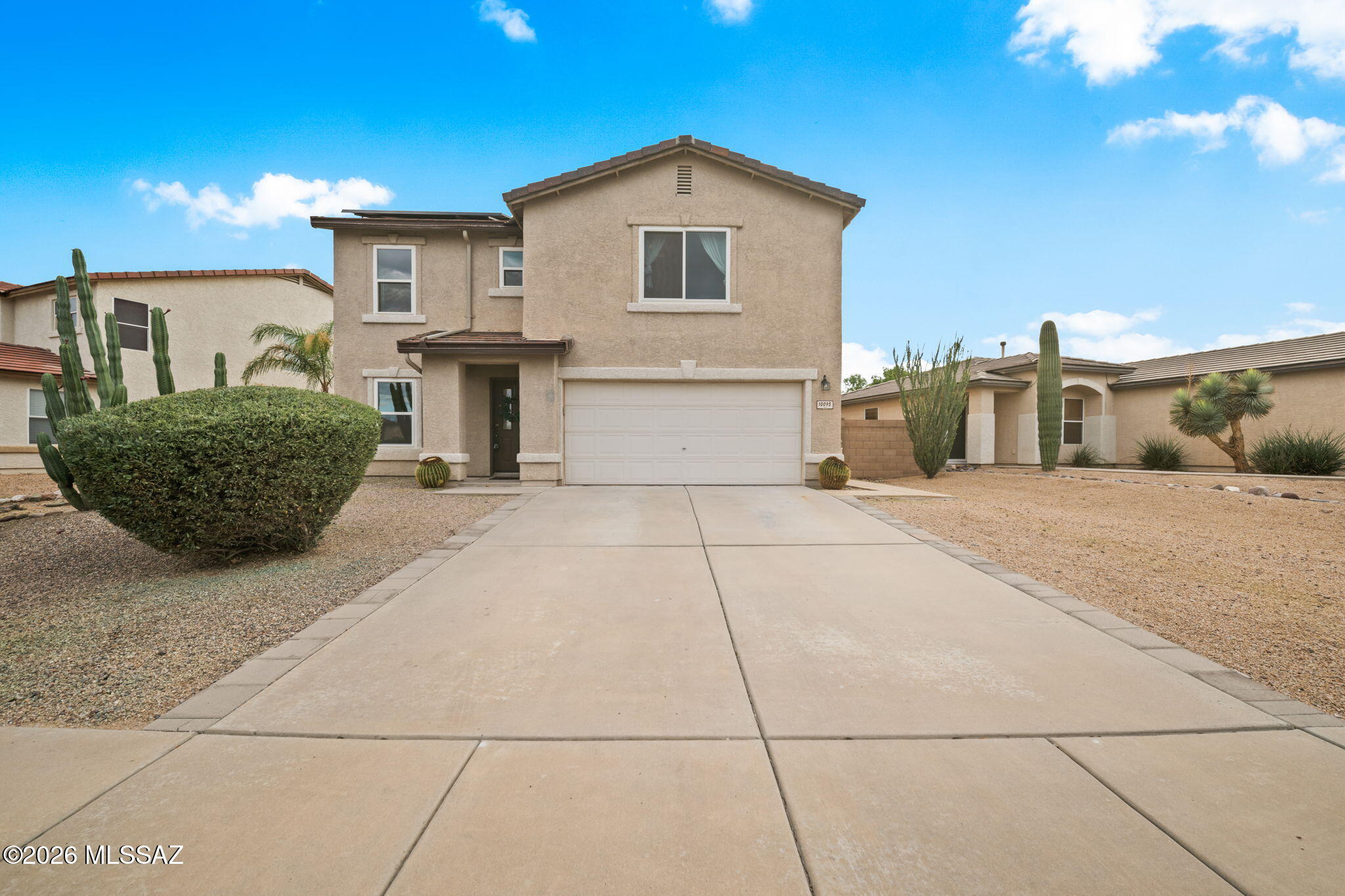 Seller will accept or counter offers between $475,000-$500,000. Welcome to this spacious Continental Ranch home offering 4 bedrooms, 2.5 bathrooms, leased solar, and your own backyard pool! A formal living and dining area, separate family room, and generous upstairs loft provide plenty of room to relax and entertain, with flexible space for a home office, hobbies, or play. The bright kitchen features white cabinetry, contrasting hardware, a tile backsplash, and a large center island with abundant workspace and storage. Opening to the family room, this comfortable gathering space keeps everyone connected. Wood-look flooring downstairs adds warmth, while all four bedrooms feature walk-in closets for convenient storage. Outside, enjoy a refreshing swim or unwind beneath the covered patio. The spacious backyard offers room to add your personal touches and create your ideal outdoor retreat. A two-car garage completes the home. Conveniently located near shopping, dining, Tucson Premium Outlets, and I-10, this home combines comfortable living with easy access to everyday essentials.