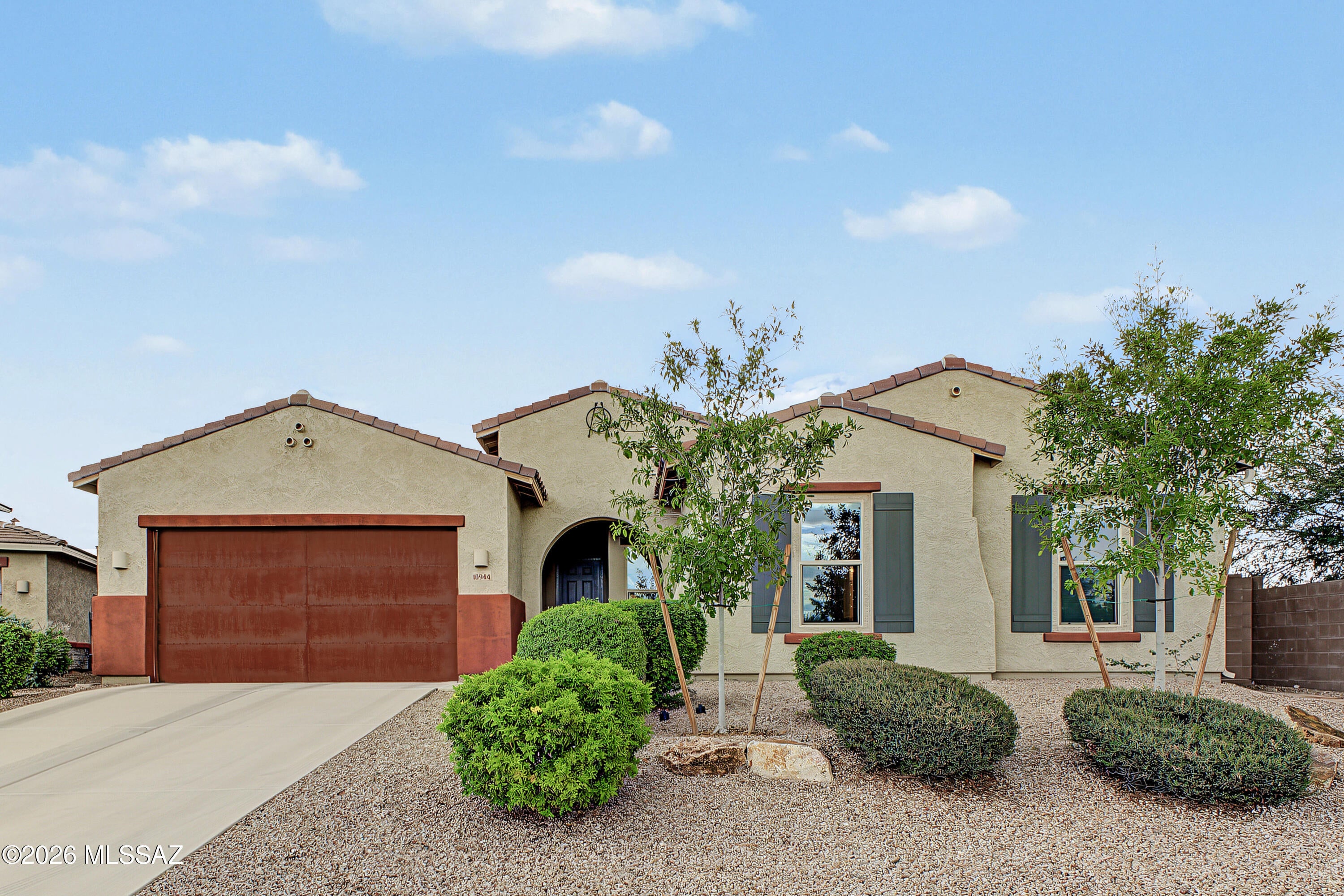 **RANGE PRICED $875,000 TO $900,000. SELLER MAY COUNTER OFFERS DEPENDING ON TERMS**

Where Mountain Views Meet Everyday Luxury!

Some homes simply check the boxes. This one makes you want to check the calendar and move right in.

Tucked at the end of a cul-de-sac, this beautifully designed single-story, Patagonia 3040E/S model, by Meritage delivers an exceptional combination of privacy, flexibility, indoor-outdoor living, and unobstructed Pusch Ridge Mountain views. The backyard flows seamlessly into open green space creating a remarkably open and private backyard due to the neighboring home's lot positioning .

Built in 2016........ CLICK MORE TO CONTINUE This thoughtfully designed 4-bedroom, 2.5-bath home offers an open-concept layout with a desirable split-bedroom design. Generous living spaces with 10' ceilings flow naturally from room to room, creating an ideal setting for everyday living, entertaining, hobbies, working from home, multi-gen living, or simply enjoying the space you've always wanted.

And then there's the backyard.  Step outside to your own private retreat featuring a heated saltwater pool and spa, surrounded by travertine and artificial turf for a low maintenance/low care yard leaving more time to relax and enjoy.  The East facing backyard is a gift that let's you enjoy the outdoors and stunning views all year round, any time of day! The backyard oasis comes with a large covered patio and breathtaking views that change throughout the day. Start the day with spectacular mountain vistas and sunrise, enjoy the ever-changing colors of the sky, and finish the day with gorgeous sunset and select city-light views. The backyard is plumbed with gas for a future outdoor kitchen or your grill, making it easy to envision taking outdoor entertaining to the next level. La Cholla Blvd. is a distance of almost 2 football fields from the house minimizing potential road noise while enjoying the outdoors.

Inside, the split-bedroom floor plan provides flexibility for a variety of needs, while the generous spaces offer room for dedicated work areas, creative pursuits, guests, extended living arrangements, or whatever life brings next.

A 3-car tandem garage provides abundant parking, storage, and flexibility for vehicles, recreational equipment, workshop space, or additional storage

From the cul-de-sac location, East facing backyard with unobstructed, expansive mountain views to the resort-style backyard and versatile floorplan, this is a home designed to be enjoyed--not just admired.  Come see the views. Stay for the lifestyle.