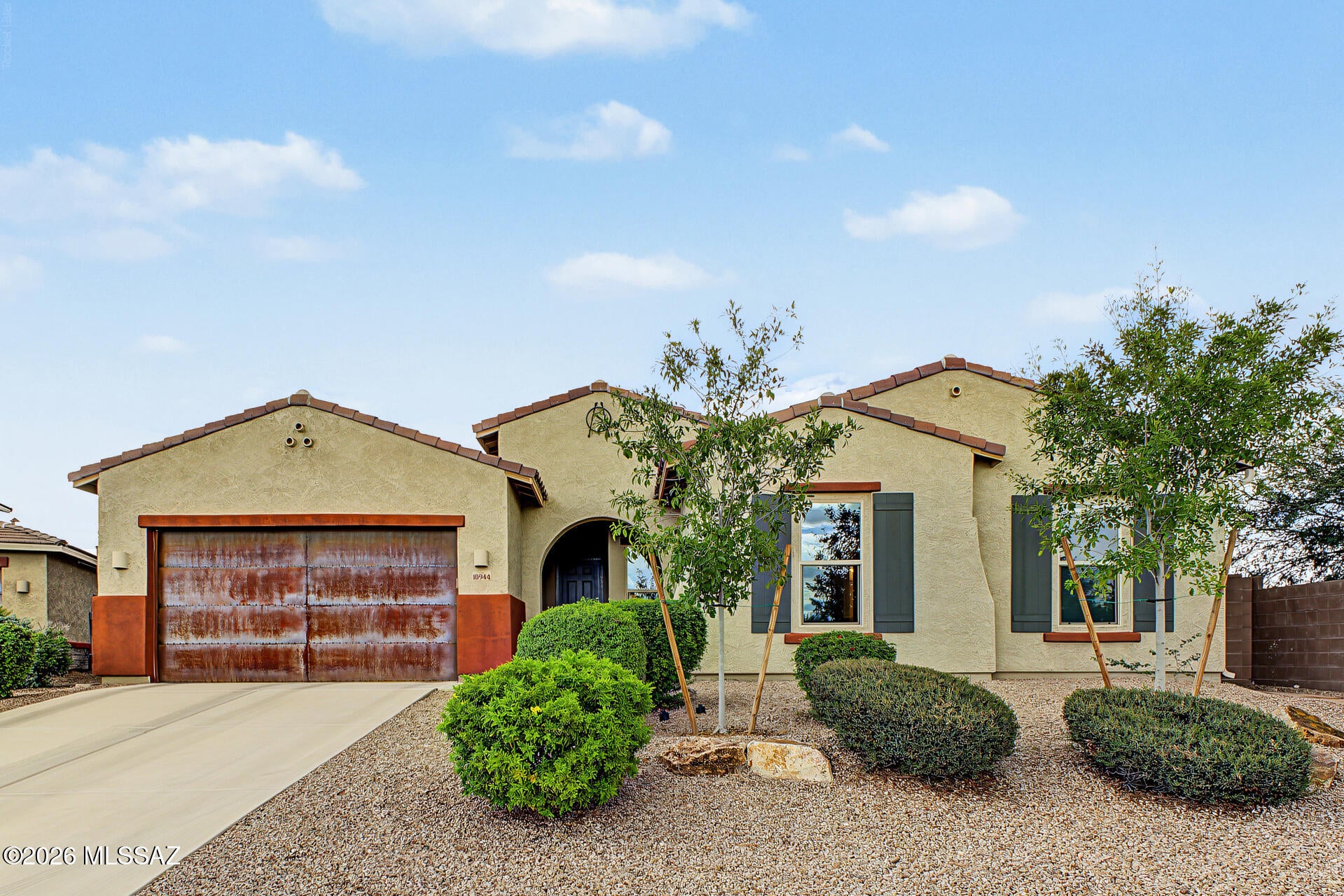 **RANGE PRICED $875,000 TO $900,000. SELLER MAY COUNTER OFFERS DEPENDING ON TERMS**

Where Mountain Views Meet Everyday Luxury!

Some homes simply check the boxes. This one makes you want to check the calendar and move right in.

Tucked at the end of a cul-de-sac, this beautifully designed single-story, Patagonia 3040E/S model, by Meritage delivers an exceptional combination of privacy, flexibility, indoor-outdoor living, and unobstructed Pusch Ridge Mountain views. The backyard flows seamlessly into open green space creating a remarkably open and private backyard due to the neighboring home's lot positioning .

Built in 2016........ CLICK MORE TO CONTINUE this thoughtfully designed 4-bedroom, 2.5-bath home offers an open-concept layout with a desirable split-bedroom design. Generous living spaces with 10' ceilings flow naturally from room to room, creating an ideal setting for everyday living, entertaining, hobbies, working from home, multi-gen living, or simply enjoying the space you've always wanted.

And then there's the backyard.  Step outside to your own private retreat featuring a heated saltwater pool and spa, surrounded by travertine and artificial turf for a low maintenance/low care yard leaving more time to relax and enjoy.  The East facing backyard is a gift that let's you enjoy the outdoors and stunning views all year round, any time of day! The backyard oasis comes with a large covered patio and breathtaking views that change throughout the day. Start the day with spectacular mountain vistas and sunrise, enjoy the ever-changing colors of the sky, and finish the day with gorgeous sunset and select city-light views. The backyard is plumbed with gas for a future outdoor kitchen or your grill, making it easy to envision taking outdoor entertaining to the next level.

Inside, the split-bedroom floor plan provides flexibility for a variety of needs, while the generous spaces offer room for dedicated work areas, creative pursuits, guests, extended living arrangements, or whatever life brings next.

A 3-car tandem garage provides abundant parking, storage, and flexibility for vehicles, recreational equipment, workshop space, or additional storage

From the cul-de-sac location, East facing backyard with unobstructed, expansive mountain views to the resort-style backyard and versatile floorplan, this is a home designed to be enjoyed--not just admired.  Come see the views. Stay for the lifestyle.