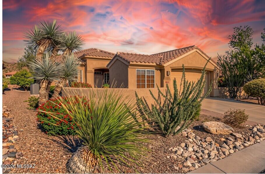 Welcome to this beautifully updated Extended Hillsboro in the desirable Highlands at Dove Mountain, where thoughtful upgrades meet spectacular golf course and mountain views. Ideally positioned on the 14th fairway, this home offers an exceptional outdoor living experience with a spacious covered rear patio, extended brick pavers, and a built-in BBQ with mini refrigerator--perfect for entertaining or enjoying a quiet Arizona evening. A small front courtyard front makes a great morning coffee spot.
Inside, this two bedroom + den, two bathroom home has been thoughtfully updated with fully renovated kitchen and bathrooms featuring high-grade granite countertops. A versatile den offers built-in cabinetry and a dedicated desk, making it an ideal home office, hobby space, or study. High end, warranteed laminate is consistent throughout the home.
The impressive garage setup includes a two-car garage plus a separate golf cart garage, all finished with durable epoxy flooring that extends to the driveway and sidewalk. Additional improvements include a new water heater and water softener for added peace of mind.
Enjoy the added ambiance of whole-house surround sound, both inside and out, allowing you to bring your favorite music seamlessly into your indoor and outdoor living spaces.
With its desirable fairway location, mountain views, extensive outdoor entertaining space, and numerous updates, this Extended Hillsboro offers the best of Dove Mountain living--a home designed to enjoy the relaxed, resort-style way of life at the of The Highlands at Dove Mountain.