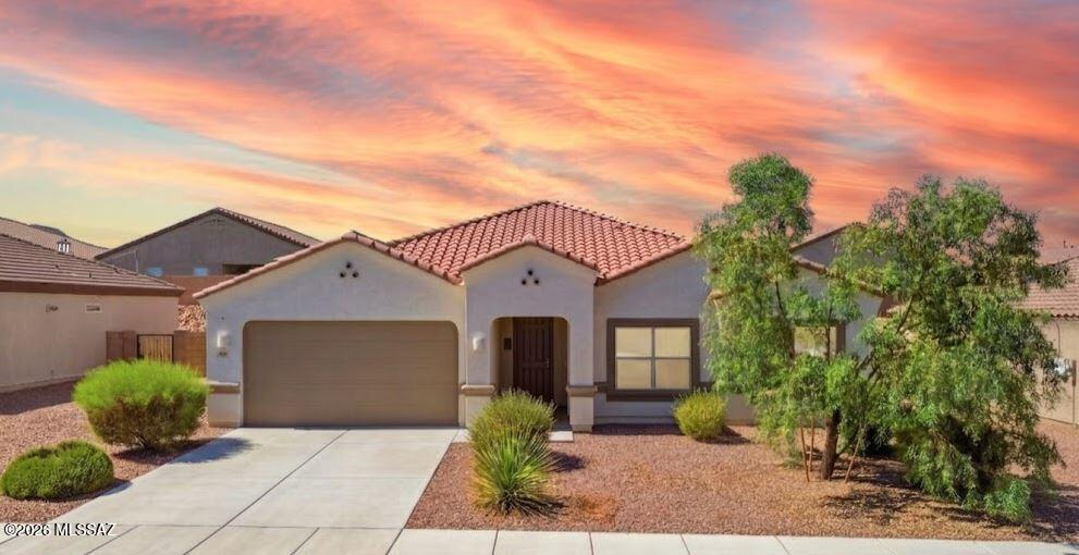 Welcome home to a 3.5% (APR 3.58%) VA assumable loan (open to non-VA buyers) with a newer 2022-build four bedroom, two bathroom home in Corona de Tucson within the award-winning Vail School District. Clean, bright, light and ready to call home, features include a tankless water heater, gas range, off-set tile flooring, two-tone paint, granite countertops, covered porch and covered front entry. The washer and dryer stay to make this a move-in and enjoy home. The laundry room has direct access from the primary closest and the split floorplan bedroom, for easy living. The large dining area is set back to allow open concept central living, and the garage is fully painted with a landscaped front yard and long driveway. Welcome home to your retreat in Vail!