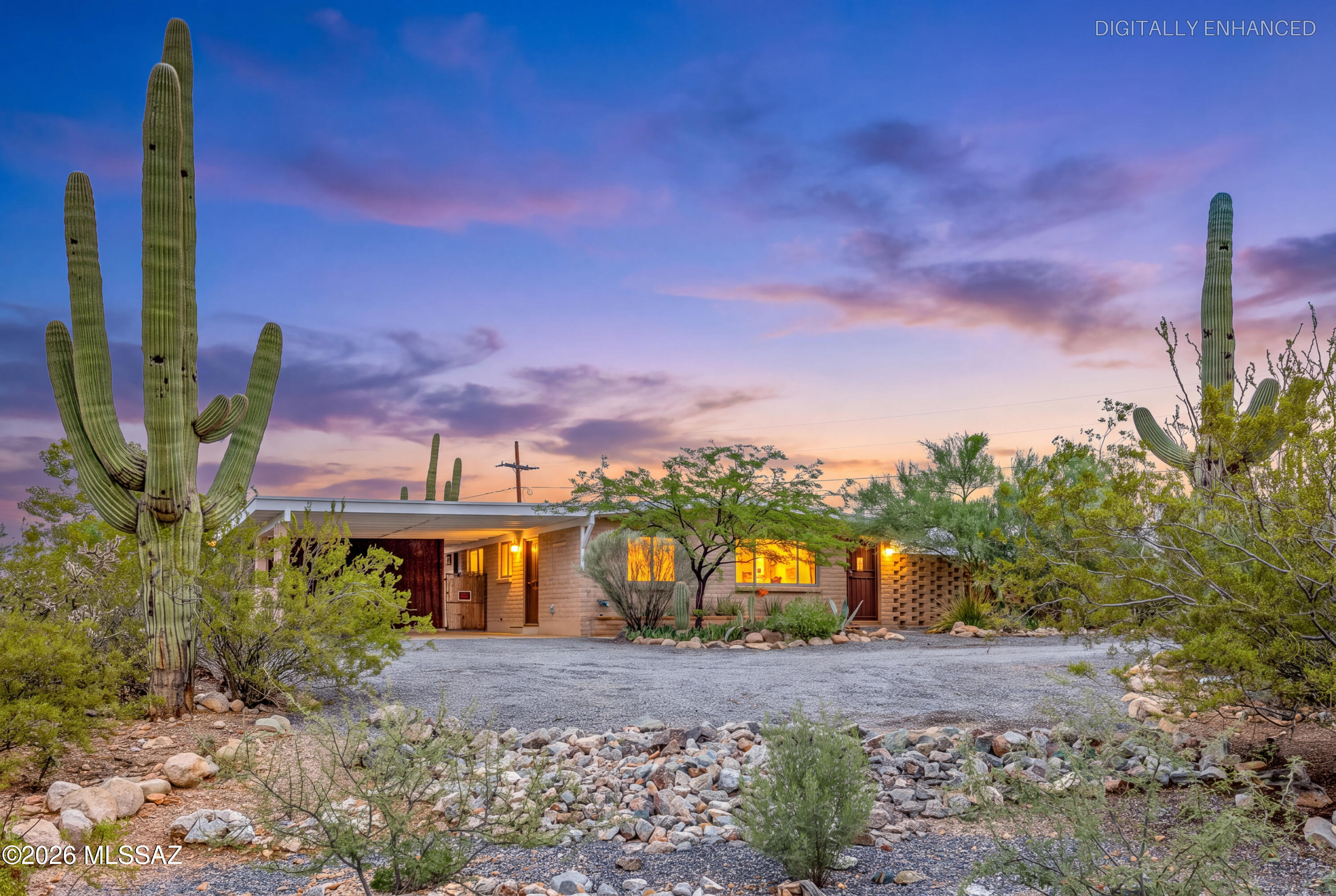 Imagine enjoying beautiful mountain views, established fruit trees, and the freedom of no HOA in a home that puts you close to everything Tucson has to offer! This inviting property offers convenient access to downtown Tucson while providing space to enjoy your own outdoor retreat. Inside, you'll appreciate the newer HVAC system, updated electrical panel, and stylish LVP flooring. The roof was recoated in 2024, offering additional peace of mind. Established fruit trees add charm and character to the outdoor space, while alley access provides added convenience and flexibility. With its desirable features, mountain views, and convenient location, this home offers a wonderful opportunity to enjoy the best of Tucson living!