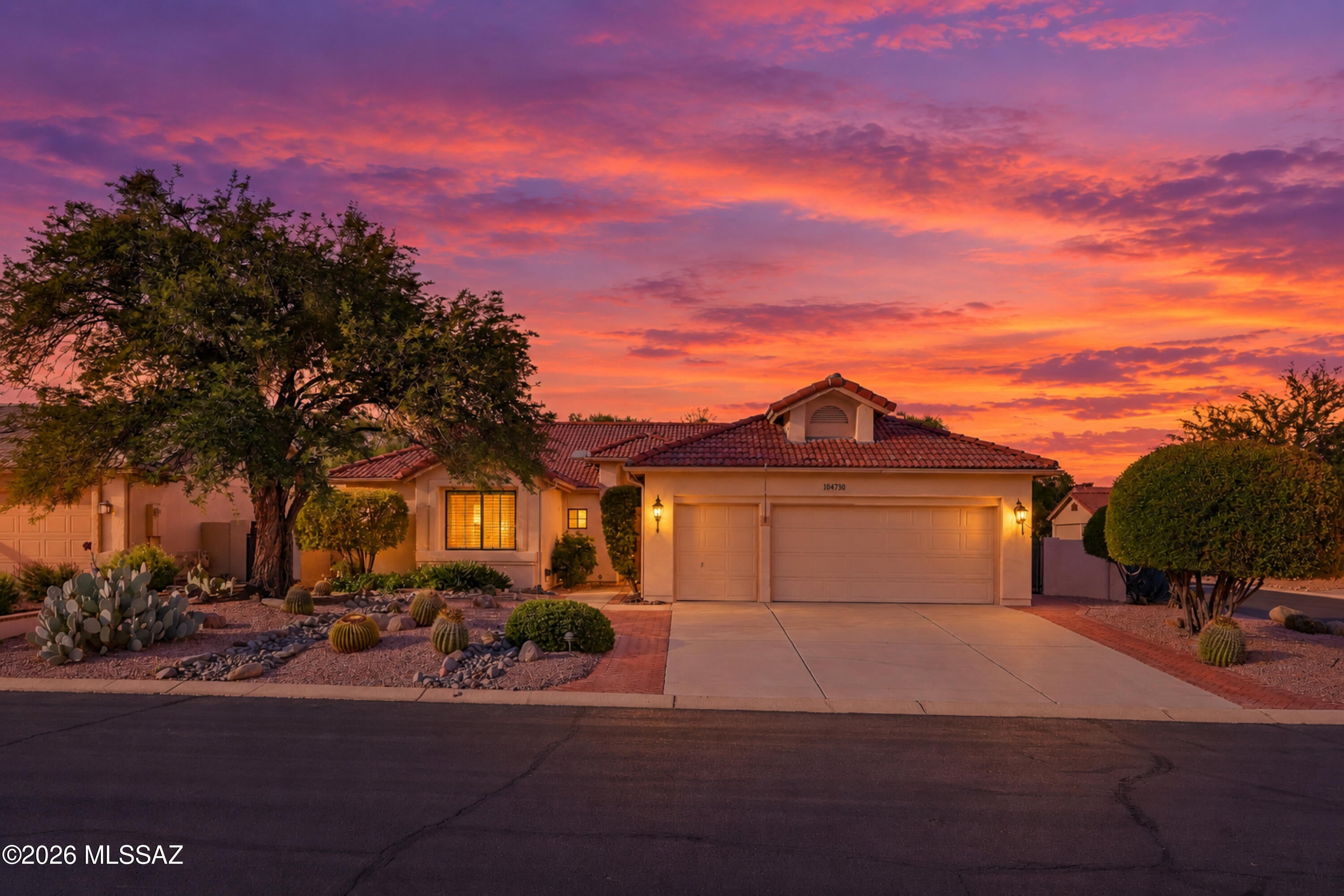 BRAND-NEW ROOF GOING ON FOR NEW BUYERS! A beautifully UPDATED Paloma model offering 2,166 sq ft of light-filled living on a large, private corner lot in SaddleBrooke One, Pinal County's premier 55+ resort community. Soaring ceilings and exceptional privacy set the tone the moment you step inside. This stunning home offers 2 BEDROOMS, 2.5 BATHS and a generous DOUBLE-DOOR DEN with a built-
in bookcase and desk, ideal for a home office, library or hobby retreat. Crisp WHITE PLANTATION SHUTTERS THROUGHOUT pair beautifully with gleaming new luxury laminate flooring in a warm, rich light brown. The showpiece kitchen is a true delight, with new soft-close cabinetry in a striking ivory finish,
gleaming QUARTZ countertops and all-new stainless-steel appliances, including a sleek induction MORE.. Cooktop. Elegant formal living and dining spaces flow seamlessly to the patio, while the inviting family room centers on a cozy gas fireplace, a convenient wet bar or coffee station and its own separate
sliders. Retreat to the spacious primary suite, complete with dual vanities, a luxurious soaking tub, walk-in shower, walk-in closets and private patio access. An en-suite guest bedroom provides comfort and privacy for visiting family and friends. Peace of mind comes with two HVAC systems, one brand new and one just 6 years old. Step outside to your own serene desert oasis: a beautifully landscaped backyard with privacy and breathtaking mountain views. One of the builders' best upgrades is the full-length covered patio that stays shady and cool all day, perfect for morning coffee or evening entertaining. The 2.5-CAR GARAGE boasts epoxy floors and built-in storage cabinets. Live the SaddleBrooke One lifestyle! Nestled in the foothills of the Santa Catalina Mountains, SaddleBrooke One offers resort-style amenities that are free for residents (golf memberships
separate): a main pool and lap pool, spas and recently expanded fitness center with new training equipment and group fitness space, and locker rooms with saunas and whirlpools. Enjoy an 8-court tennis center with Pop Tennis markings, pickleball, bocce, a
basketball court, walking paths and cycling. Golfers will love SaddleBrooke's renowned courses. Inside, the main clubhouse hosts dance clubs and events, along with an Arts & Crafts Center, library, billiards and card room, an Activity Center for parties and gatherings, on-site dining and a 24-hour patrol. With dozens of clubs and activities, every day is full of new possibilities!