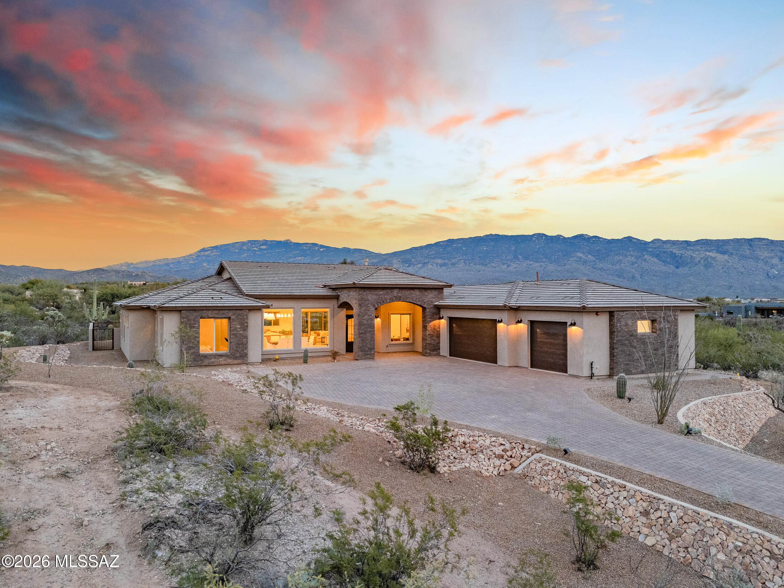 Experience elevated living on a premier homesite in Phase II of Rancho Soldados.  This 4BR/4.5BA/3-car garage residence is on the perimeter of a beautiful gated community with east facing rear yard with mountain views in al directions.  Designed with elegance and thoughtfully planned open concept living enhanced with beautiful mountain views.  Features soaring ceilings and windows, gourmet kitchen, Butler pantry, En-suites in bedrooms, walk in closets, greatroom with fireplace, large dining room, enhanced lighting throughout.  Primary bedroom, bath and closet provides retreat-like living for the owners.  Office space is privately situated in the hub of the house with steel famed glass doors and window for additional views. Public Report will be provided.