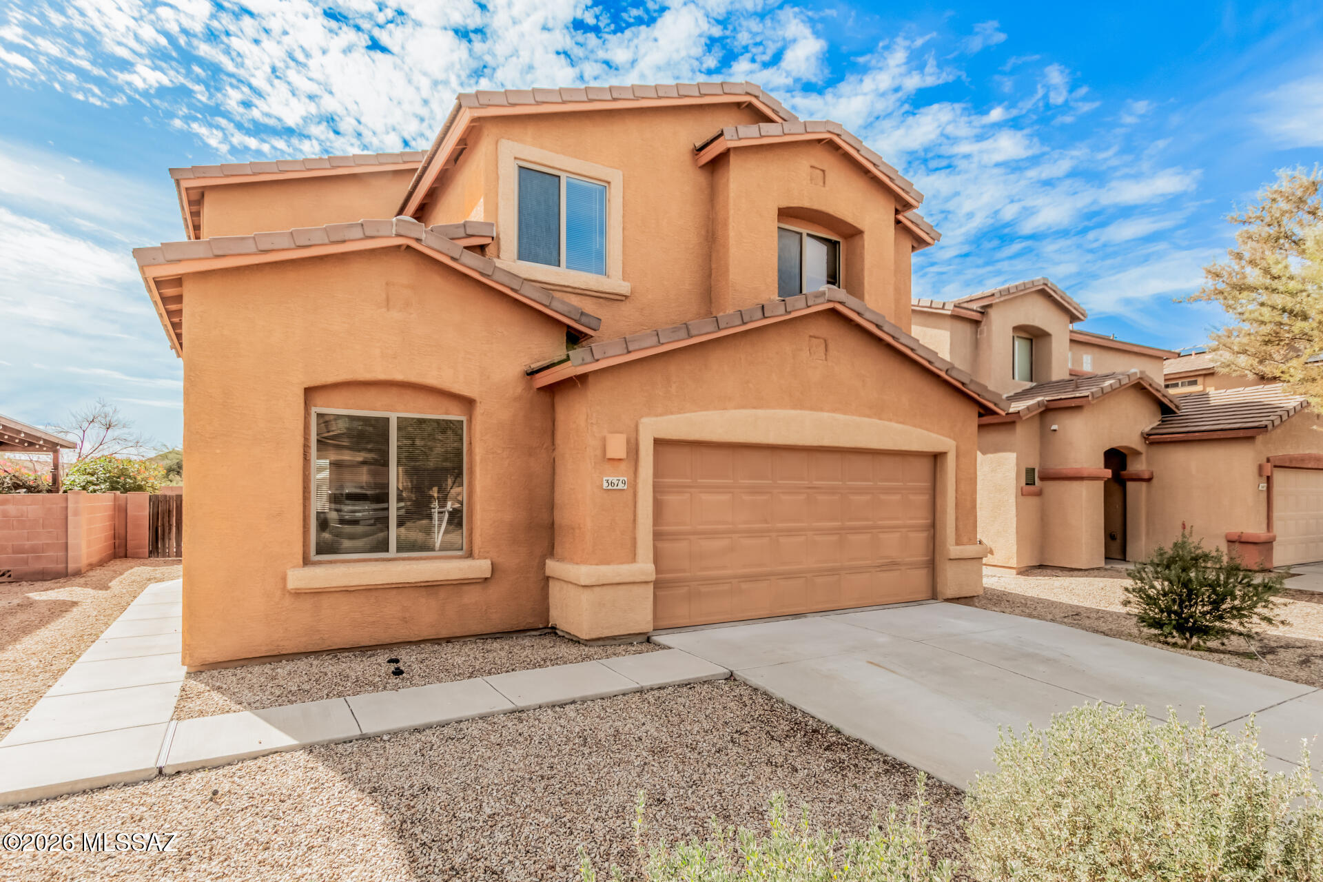 NEW PAINT, NEW FLOORING! welcome 3679 W Goshen Drive, 2,073sqft, two-story gem built in 2007 that radiates personality. Nestled in a tranquil neighborhood, this home backs to a lush common area, offering serene views and a private escape to savor Arizona's breathtaking sunsets. This inviting residence features 4 spacious bdrms, including a luxurious master-suite designed for ultimate comfort. The main level includes a flexible den, perfect for a home office, creative space, or cozy retreat. The interior dazzles with vivid, colorful flair, where bold tones and lively accents infuse every room with warmth and individuality. Just minutes away, you'll find a wealth of shopping and dining options, from the bustling Tucson Marketplace with stores like Costco and Target to local gems, or vibrant NEW PAINT, NEW FLOORING RECENTLY INSTALLED. Welcome to 3679 W Goshen Drive, 2,073sqft, two-story gem built in 2007 that radiates personality. Nestled in a tranquil neighborhood, this home backs to a lush common area, offering serene views and a private escape to savor Arizona's breathtaking sunsets. This inviting residence features 4 spacious bdrms, including a luxurious master-suite designed for ultimate comfort. The main level includes a flexible den, perfect for a home office, creative space, or cozy retreat. The interior dazzles with vivid, colorful flair, where bold tones and lively accents infuse every room with warmth and individuality. Just minutes away, you'll find a wealth of shopping and dining options within minutes. With its modern construction, smart layout, and unbeatable location, this home is a one-of-a-kind haven ready to inspire. New dishwasher installed 12/4/2025.