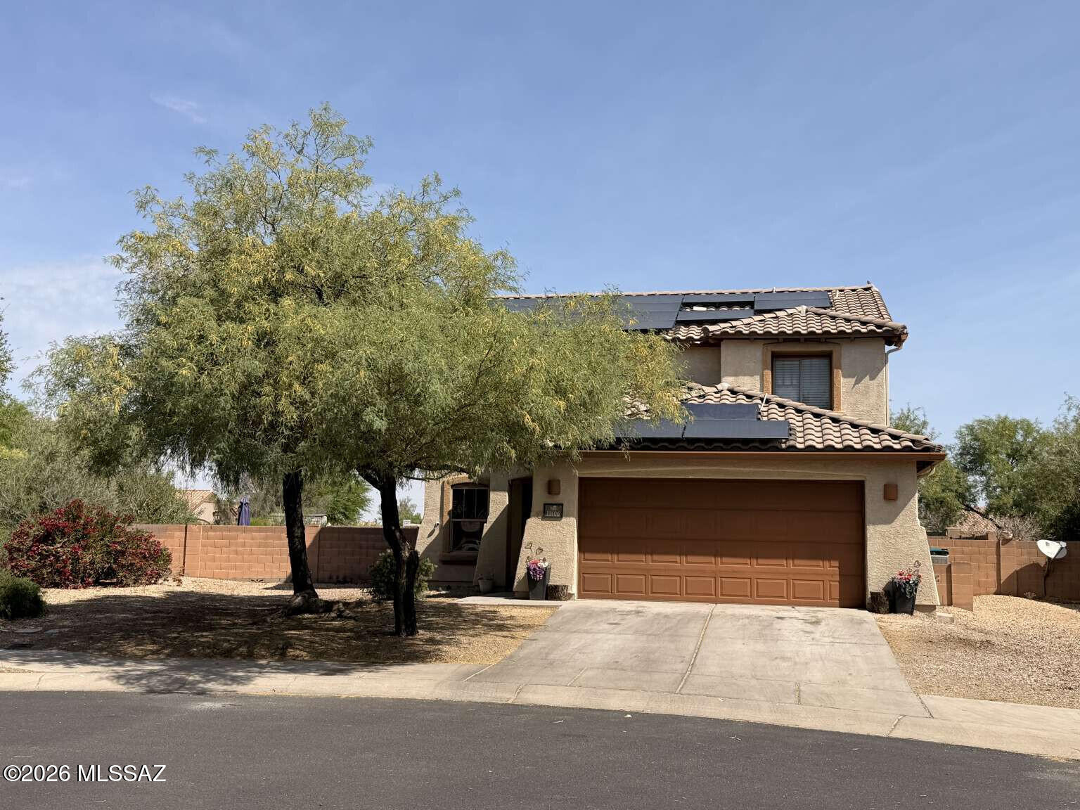 Welcome to this beautiful home in the highly desired community of Gladden Farms in Marana! This home boasts a great floor plan, high ceilings, and upgrades galore. Your kitchen is complete with stainless-steel appliances. The backyard is fully landscaped, perfect for hot summer days. Well maintained sparkling pool. Plus plenty of room on this larger lot. The home is equipped with a newer AC unit, and we can't forget the PAID IN FULL SOLAR, owned not leased.