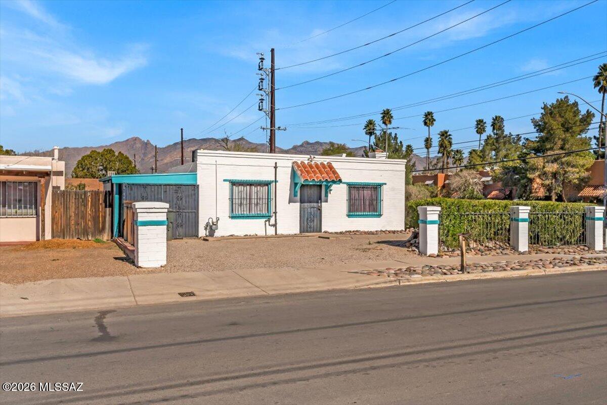 Discover a rare, beautifully updated office/apartment space in a highly visible  location. This versatile property offers an exceptional live/work or investment opportunity with clearly defined, separate uses. The office space fronts Alvernon Way, providing outstanding exposure for a professional or small business, while the apartment features a separate address, private entry, carport, and patio accessed from Monte Vista, offering privacy and convenience. The interior has been thoughtfully updated with a clean, modern aesthetic, making both spaces move-in ready and highly functional. Additional highlights include paved parking on the north side of the property, allowing for easy access for clients, tenants, or residents. The flexible layout supports a wide range of uses. From owner-occupied business space to income-producing rental potential.
Located along one of Tucson's established corridors, this property benefits from high visibility, easy access to major roads, and close proximity to shopping, dining, and everyday amenities. Opportunities like this: updated, flexible, and well-located, are rare. 
SBA, small business, and conventional financing options may be available. Contact us today for lending information.