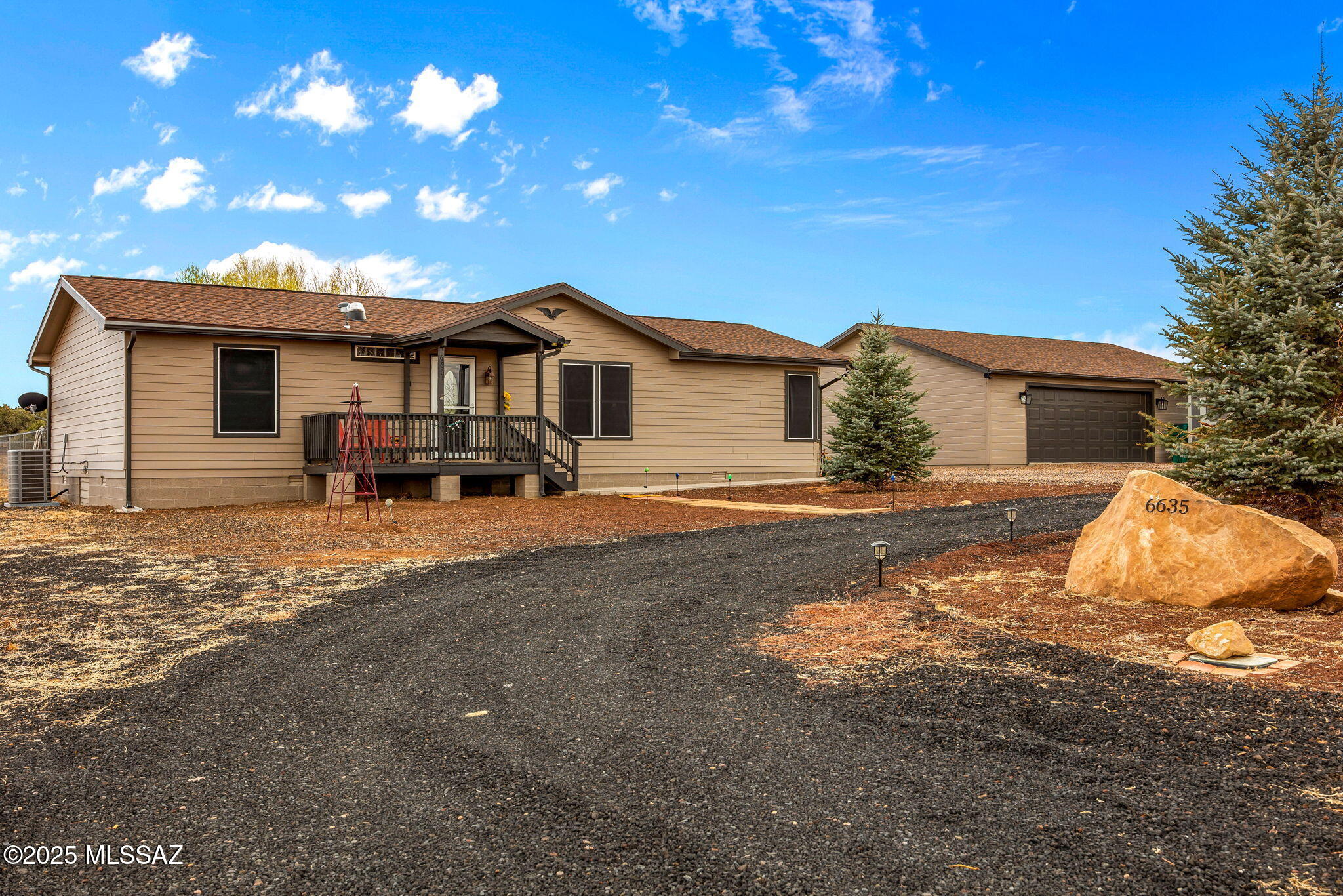 Are you looking for a meticulously maintained home with 2 acres of horse property located in a peaceful setting near the National Forest boundary? This home will be your opportunity to escape to the mountains with a cooler climate and elk as frequent visitors! The home sits on a ''solid slab'' foundation, is well laid out in a split floor plan and boasts a complete new central air system! The home has an inviting and spacious living room adjoining the kitchen and dining area. The kitchen has been remodeled, offering solid oak cabinets, new countertops, sink and most appliances. In the master suite you will find ample space, a nice walk in closet and an oversized bathroom. There are walk in closets in each of the guest bedrooms. This home has plenty of storage with additional cabinets in the laundry. Outside you will surely be impressed with the ultimate
30'x36' garage/shop. This garage is insulted/heated with a pellet stove and has enough room to park up to three vehicles/toys. Garage is loaded with storage cabinets and workspace. There is also a 12'x22' storage shed near the garage. With everything this home and property have to offer, now is the time to make your move.