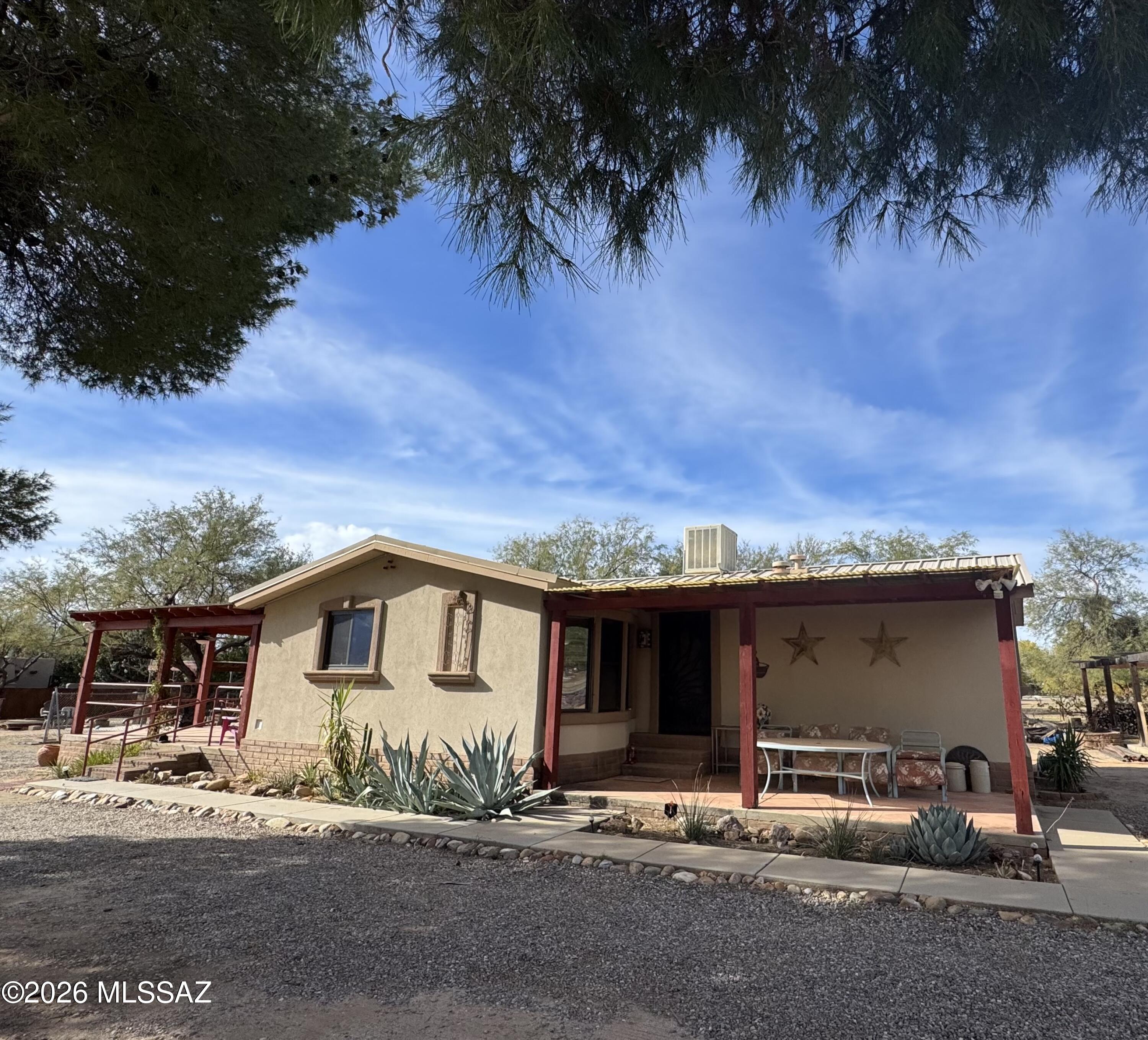 Mountain views & move-in ready! Available April 1st with 1-year minimum lease. This meticulously maintained 2BD/2BA home offers generous common space, ample parking for recreational toys, and a remote-controlled gate for added convenience. Home comes furnished and includes a refrigerator, stove, and washer/dryer in unit. Pet/horse subject to Owner approval (max 1); $500 refundable pet deposit due prior to move-in. Horse stables are located on the neighboring portion of the property and are not included in the lease. All occupants 18+ must apply at DeLexRents.com ($55 per application; debit/credit cards may incur processing fees). $150 non-refundable move-out cleaning fee due prior to move-in. Price shown includes all applicable county/city taxes. Get it now before it's gone!