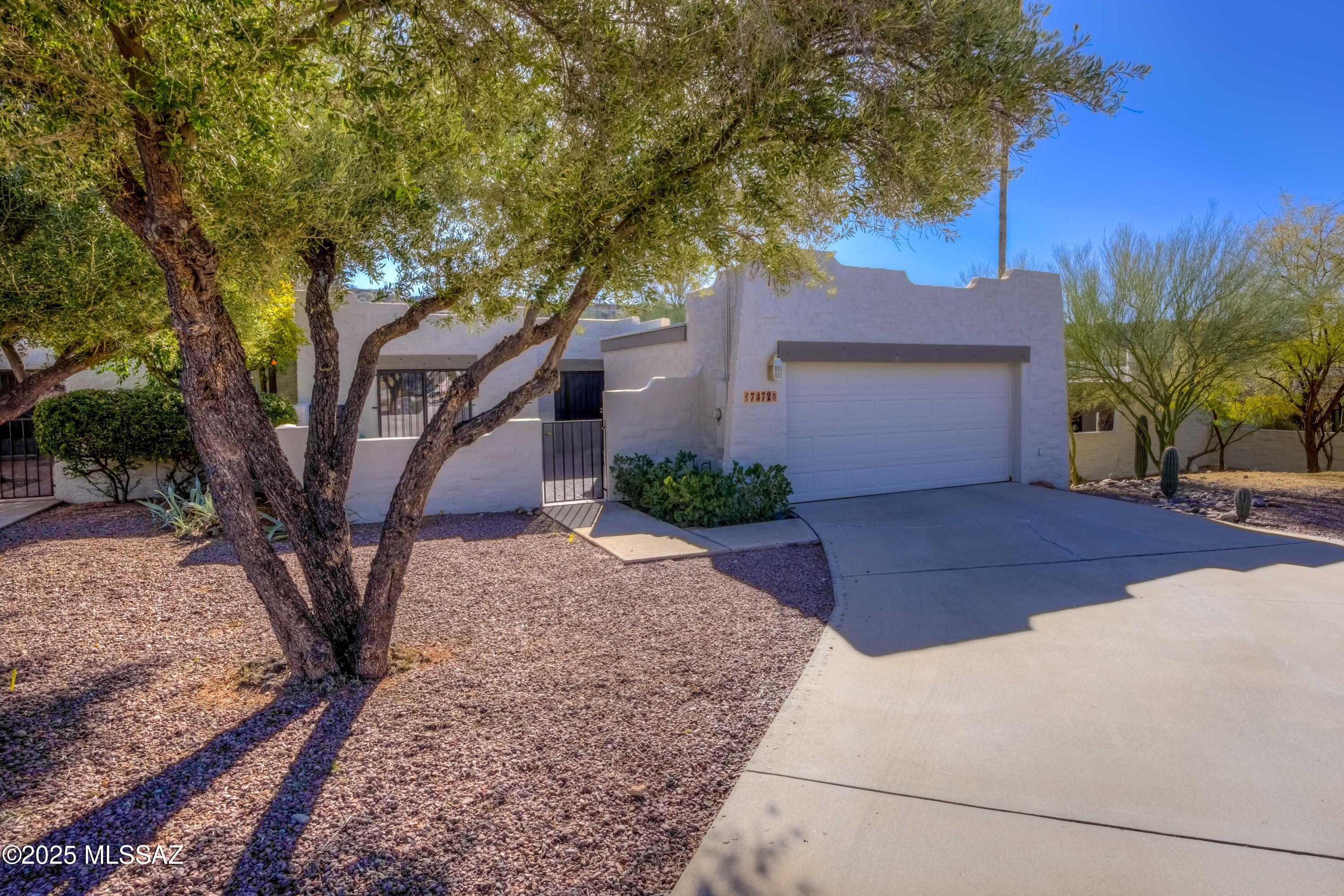 Imagine living in a resort like community, with heated pool, club house, and well maintained grounds.  Excellent opportunity for an investor, family, or snowbird, (move-in ready).  This quiet neighborhood boasts many ammenities,  including an expansive common areas, mountain views, with restaurants, and shopping close by .  Welcome to this charming 3 bdrm, 2 bath town home, nestled at the end of a peaceful cul-de-sac.  This home offers a spacious and inviting layout, highlighted by a large living area, that provides the perfect setting for entertaining or relaxation.  The open floor plan flows seamlessly from room to room, creating a comfortable , and welcoming atmosphere.   A mu