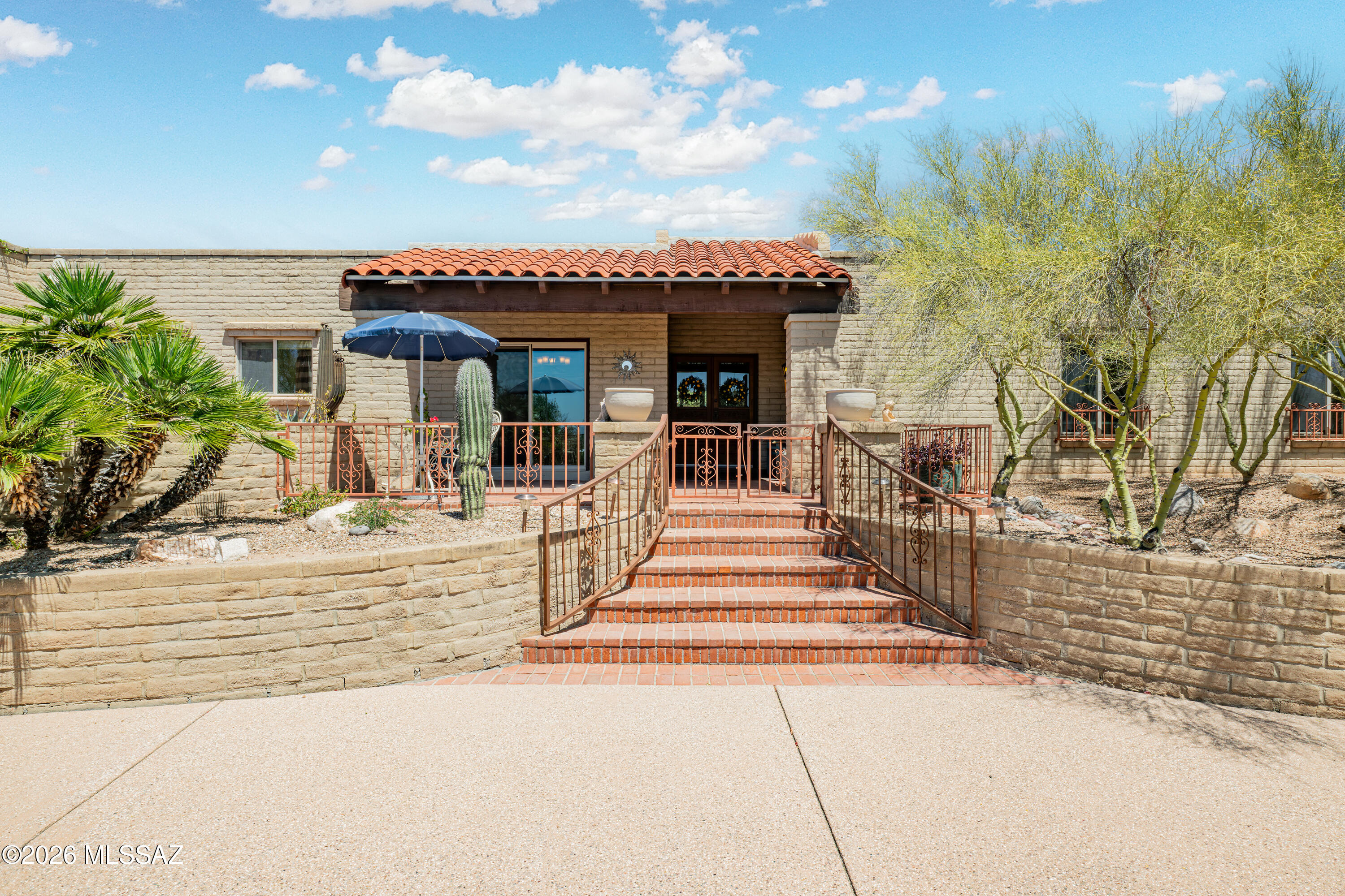 DELIGHTFUL, UPDATED MASONRY home in the heart of the AMAZING Sabino Vista Hills neighborhood w/ 3 CAR GARAGE! Fabulous, HIGH QUALITY KITCHEN w/ gorgeous granite countertops & newer appliances. Eat-in ''nook'' opens to lovely, SUPER CHARMING front patio area! Kitchen also opens to large family room w/corner fireplace, PERFECT FOR ENTERTAINING! Tons of additional cabinets/pantry space! Huge laundry room w/ storage galore & a well-placed powder room. Primary suite has beautiful wood floors & 2 roomy closets. Enjoy the HUGE SHADY COVERED PATIO & ULTRA PRIVATE BACKYARD w/ incredible fruit trees & beautiful mature landscaping. Many sliding doors open to splendid patios, ENHANCING INDOOR/OUTDOOR LIVING! What a special, well cared for home in a TRULY PHENOMENAL, IDEAL PEACEFUL NEIGHBORHOOD! HURRY!